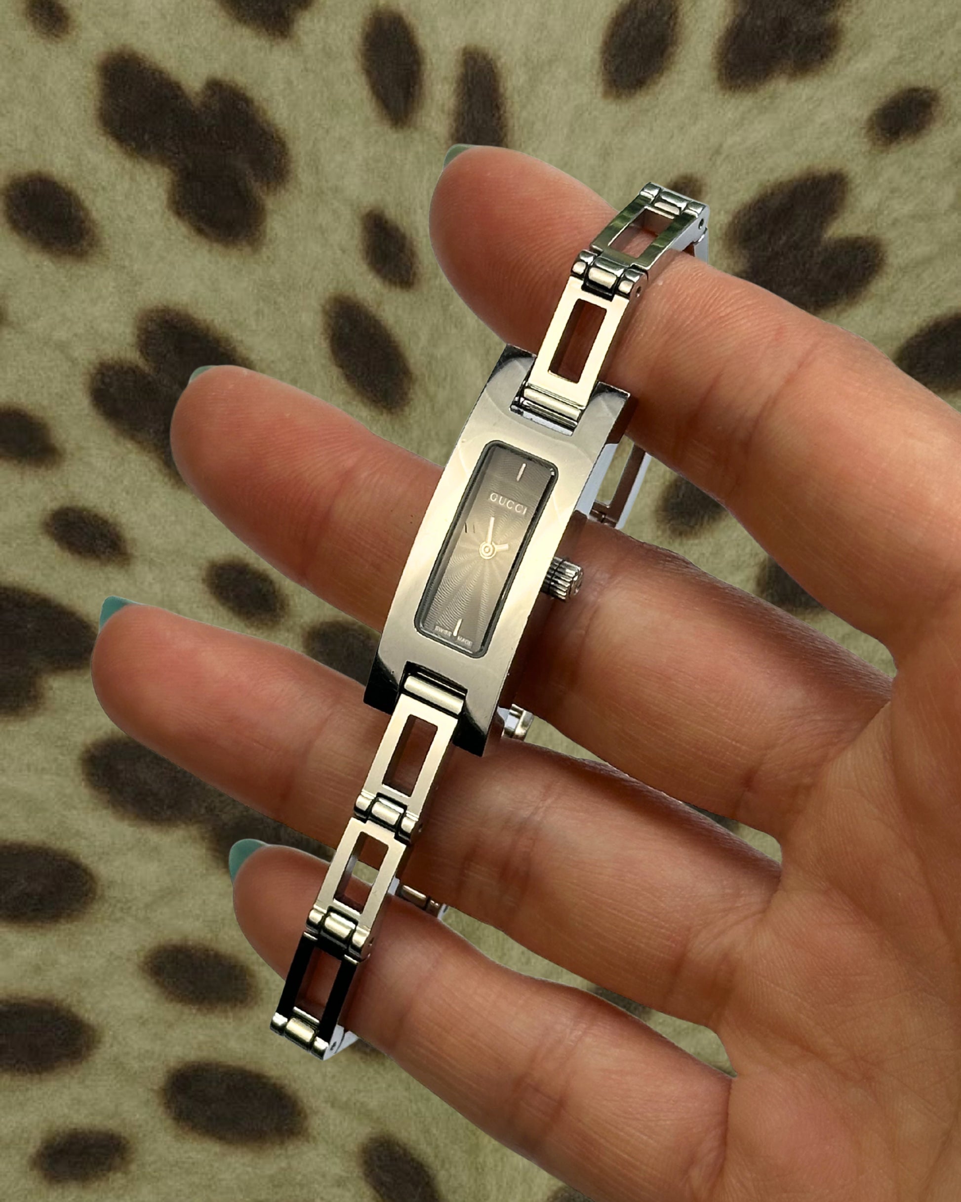 2000s Gucci silver tone silm quartz watch