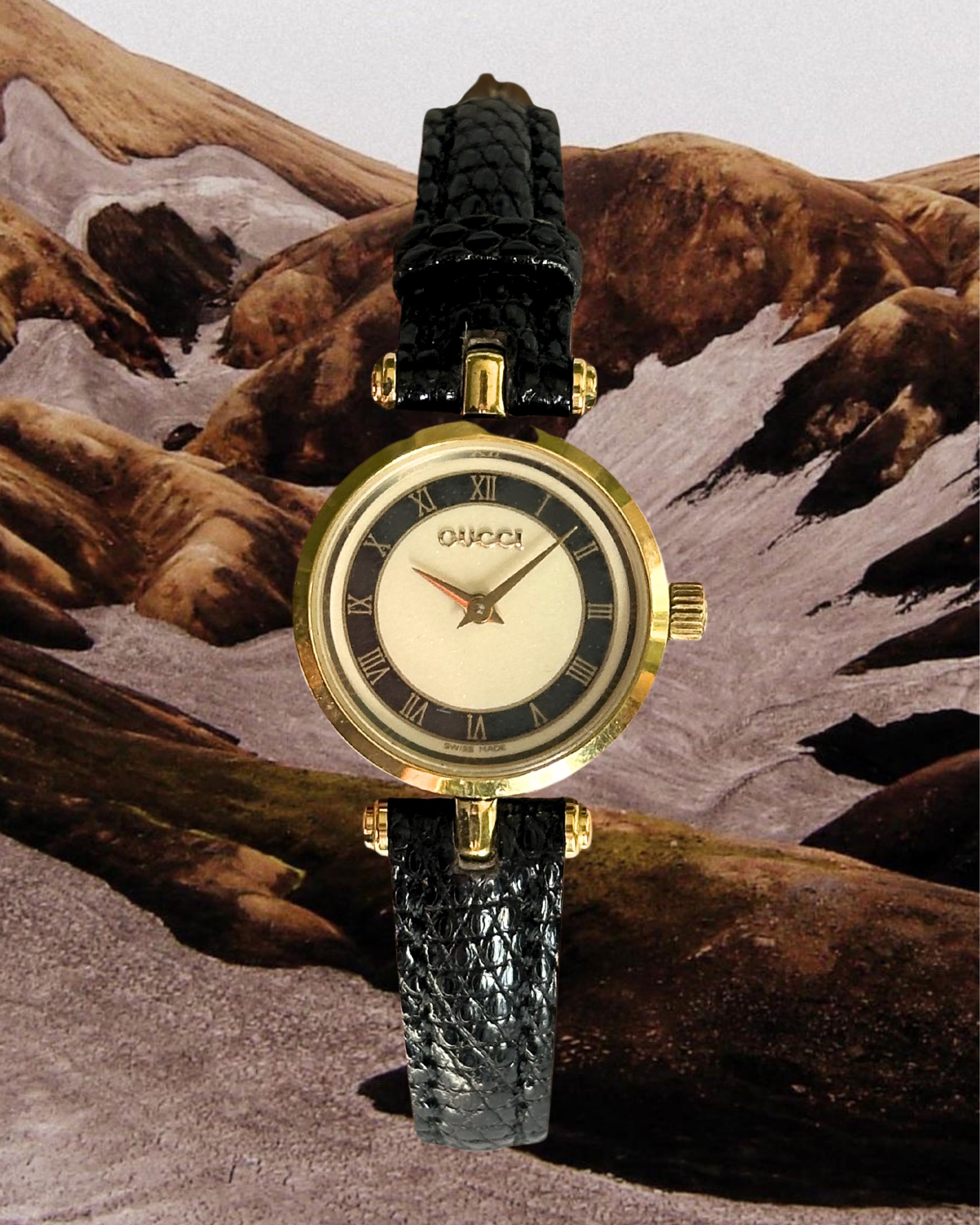 1980s Gucci Roman dial black leather quartz watch