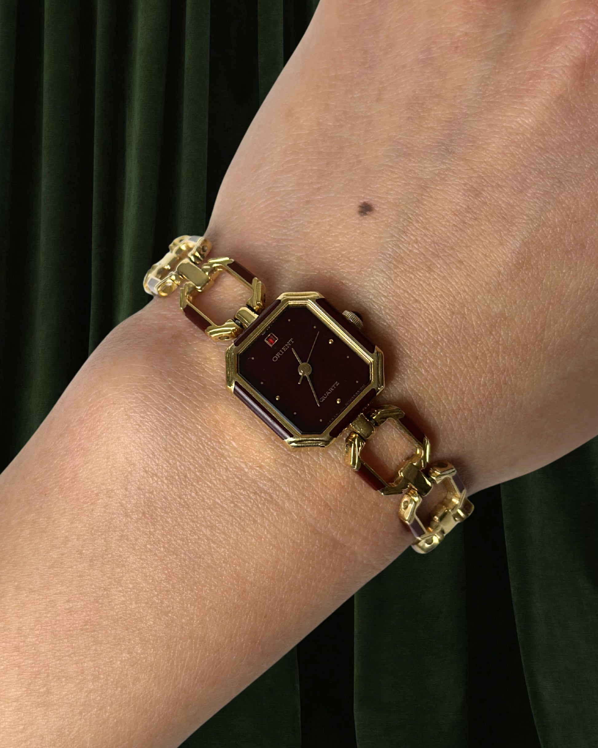 1980s Orient burgundy octagon quartz watch