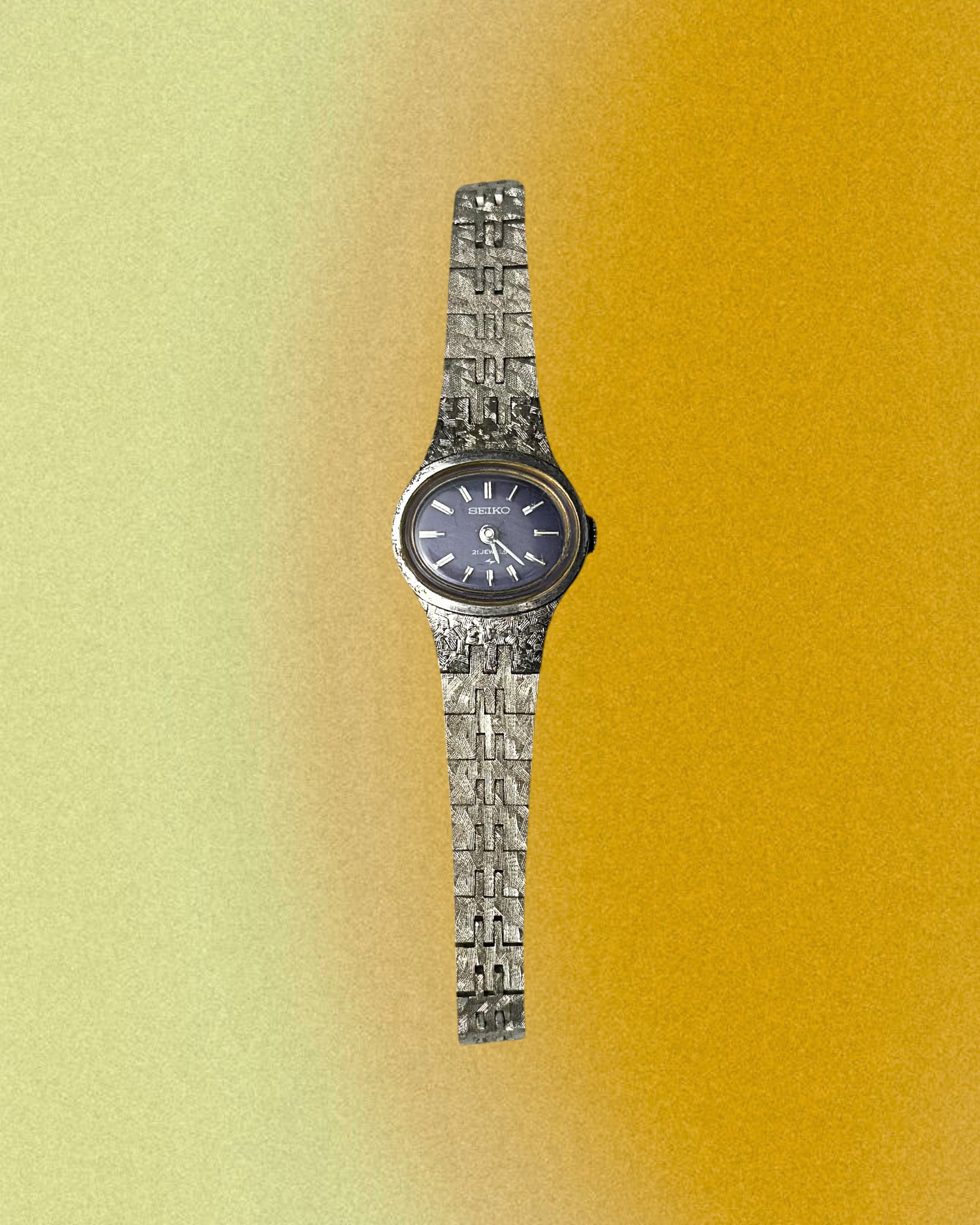 1970s Seiko navy oval silver tone mechanical watch