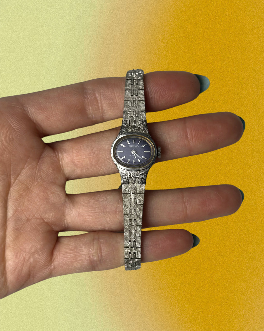 1970s Seiko navy oval silver tone mechanical watch