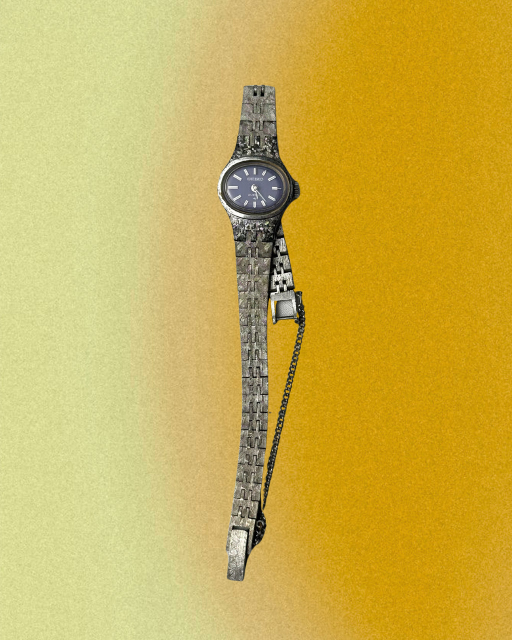 1970s Seiko navy oval silver tone mechanical watch