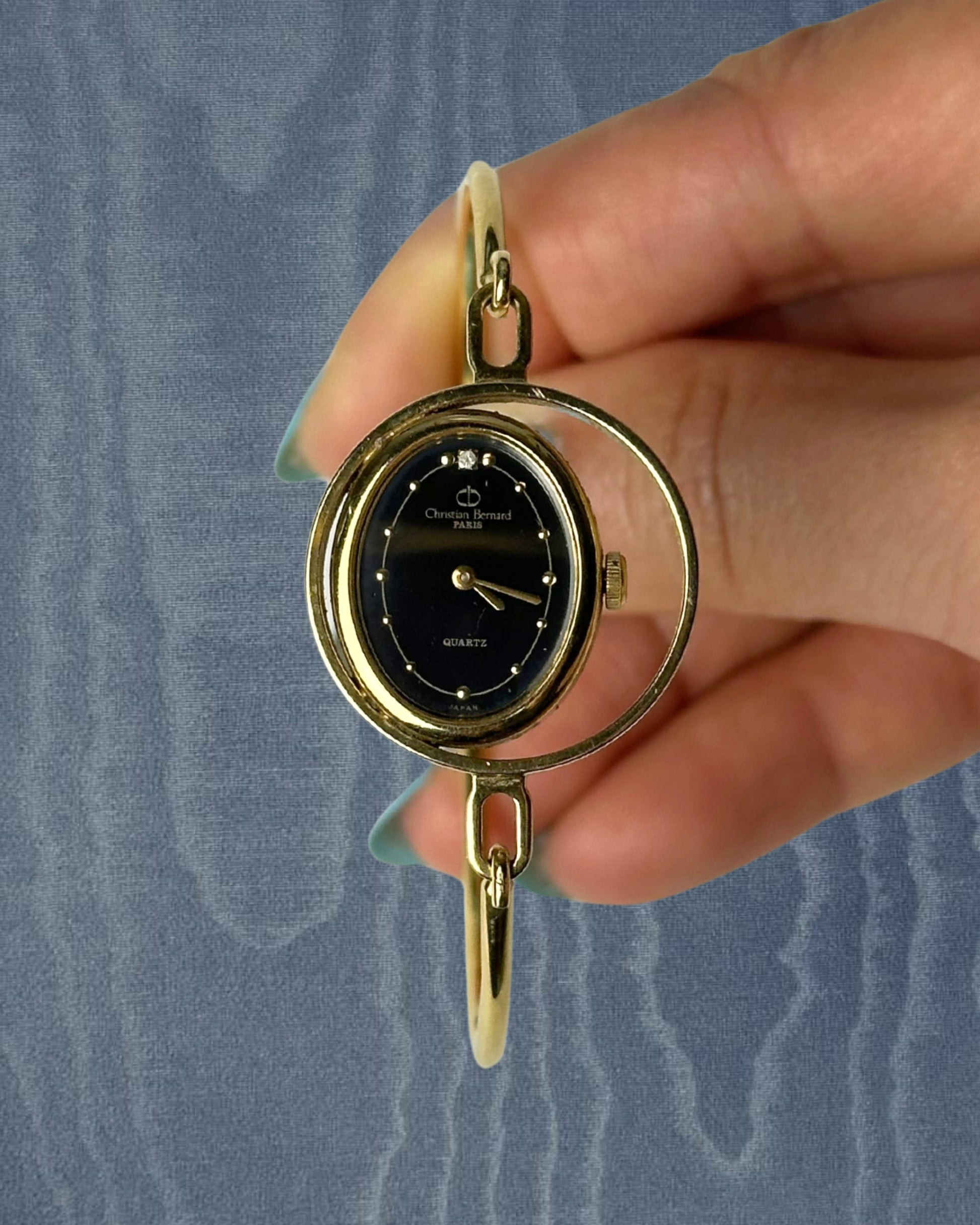 1980s Christian Bernard gold-plated bangle quartz watch