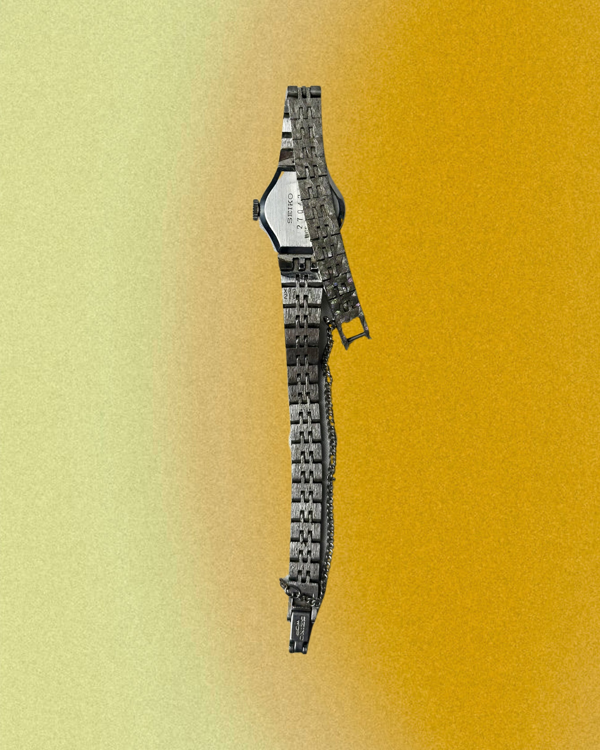 1970s Seiko navy oval silver tone mechanical watch