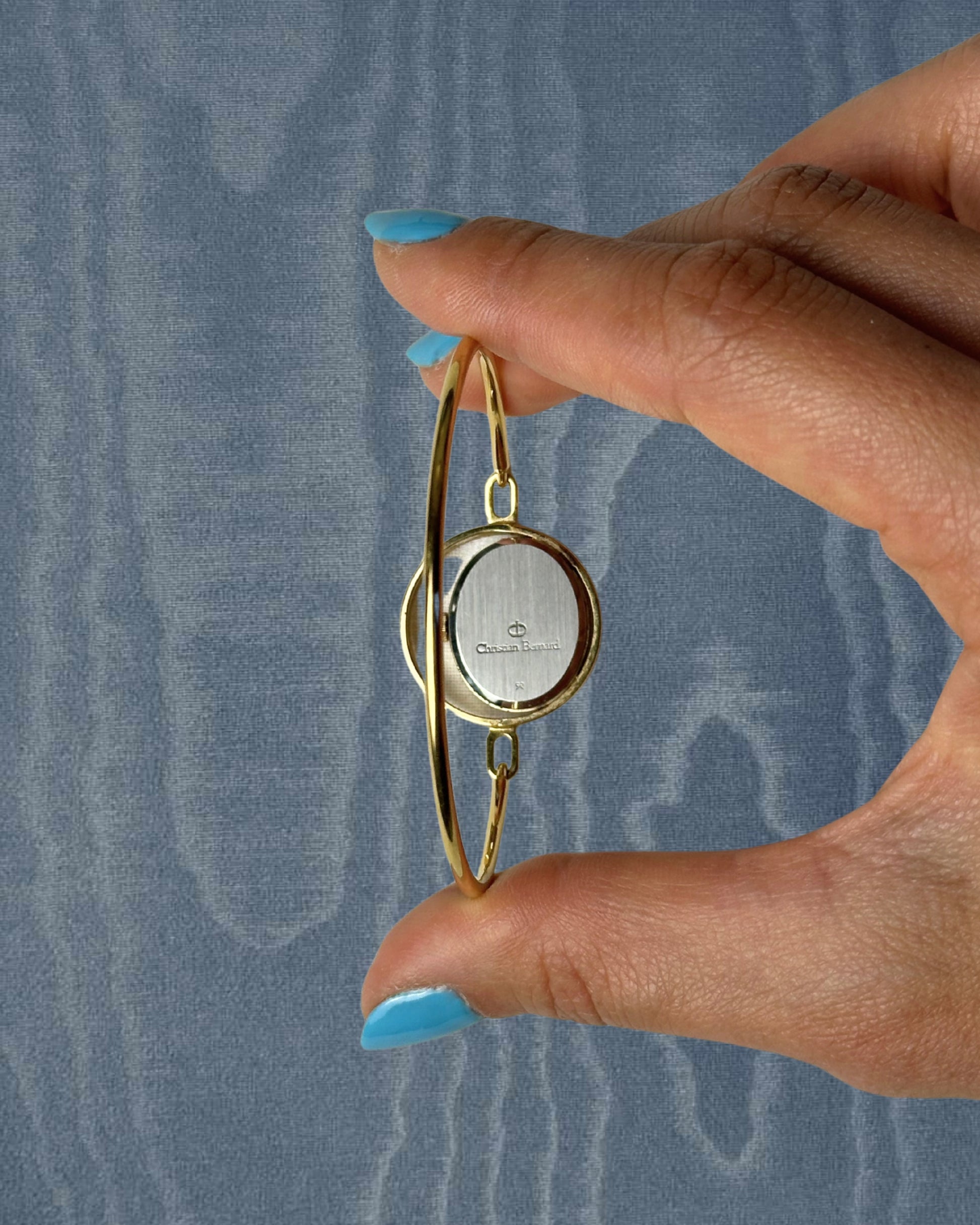 1980s Christian Bernard gold-plated bangle quartz watch