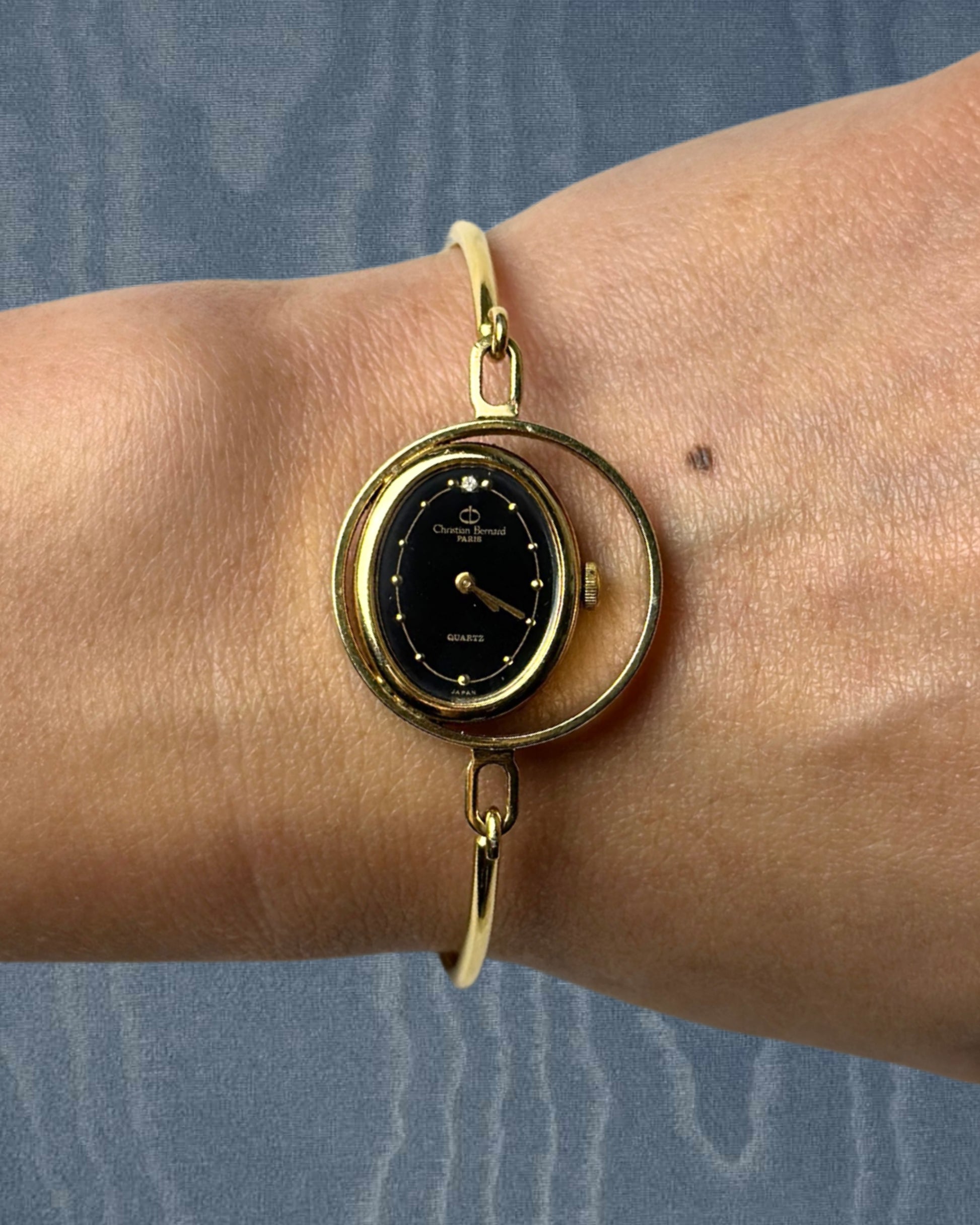 1980s Christian Bernard gold-plated bangle quartz watch