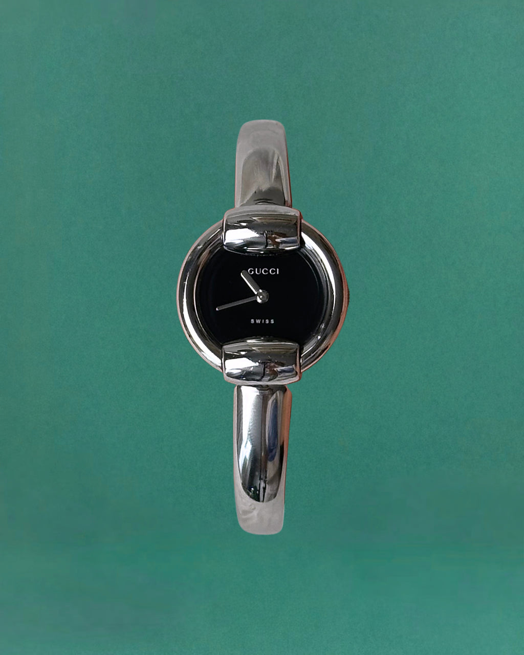 1990s Gucci Silver tone round quartz watch