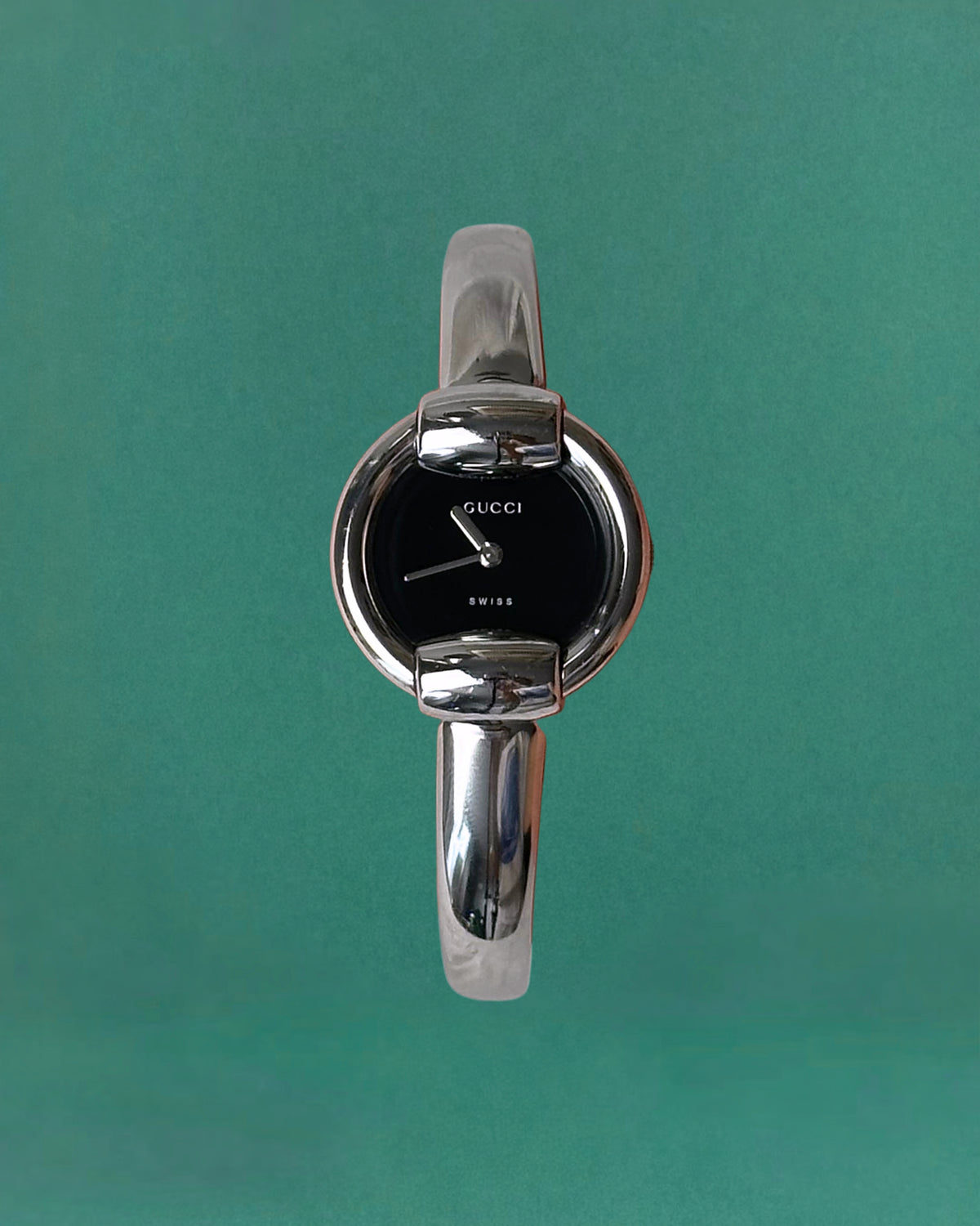 1990s Gucci Silver tone round quartz watch