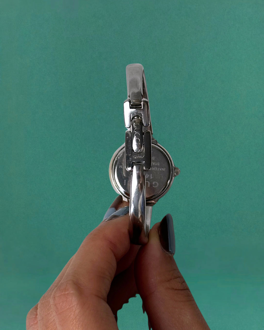 1990s Gucci Silver tone round quartz watch