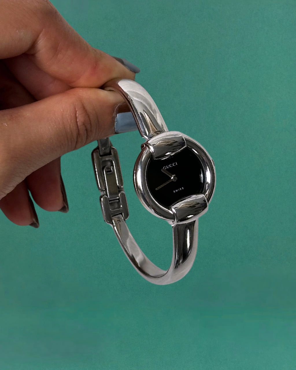 1990s Gucci Silver tone round quartz watch