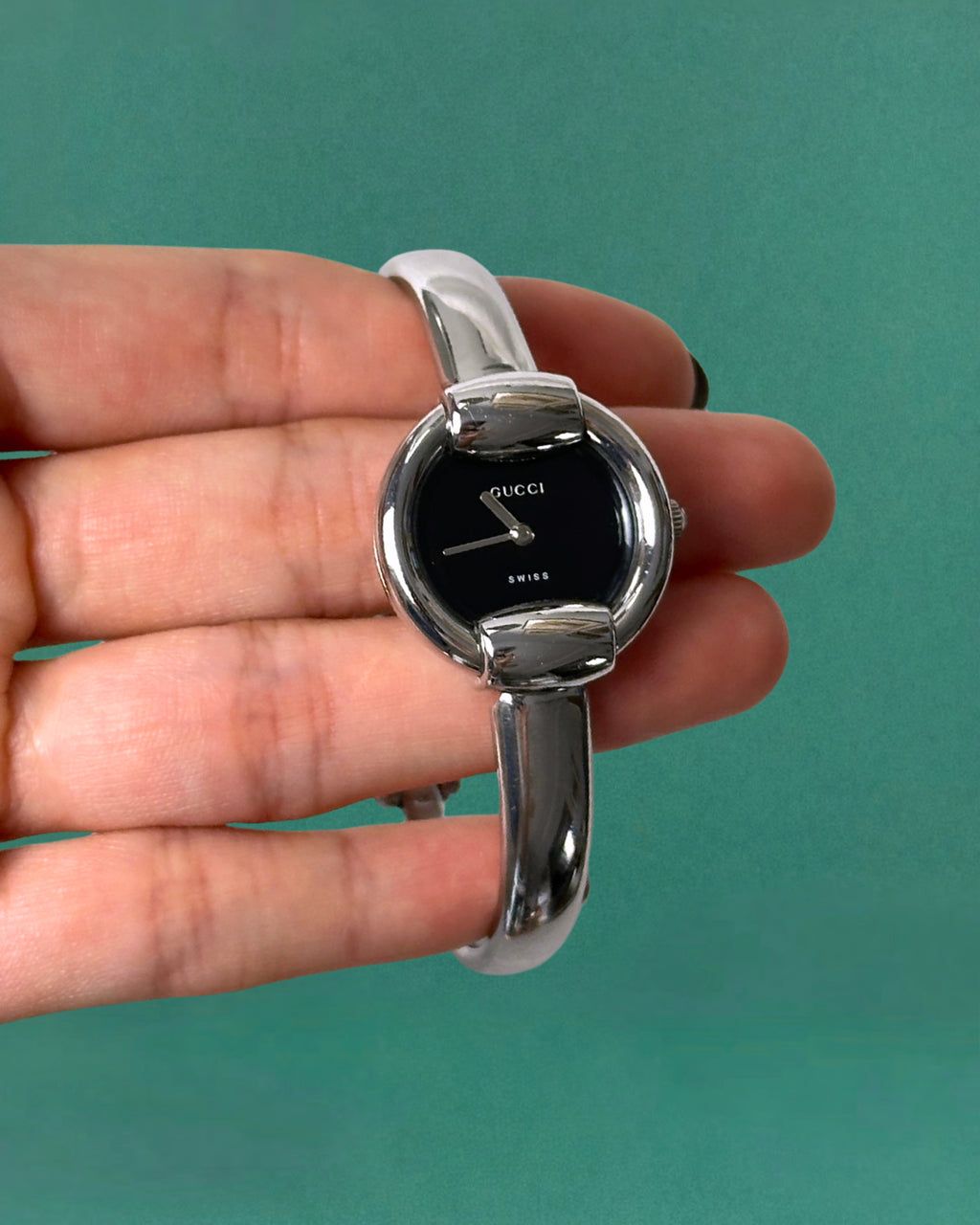 1990s Gucci Silver tone round quartz watch