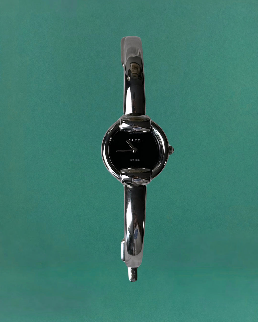 1990s Gucci Silver tone round quartz watch