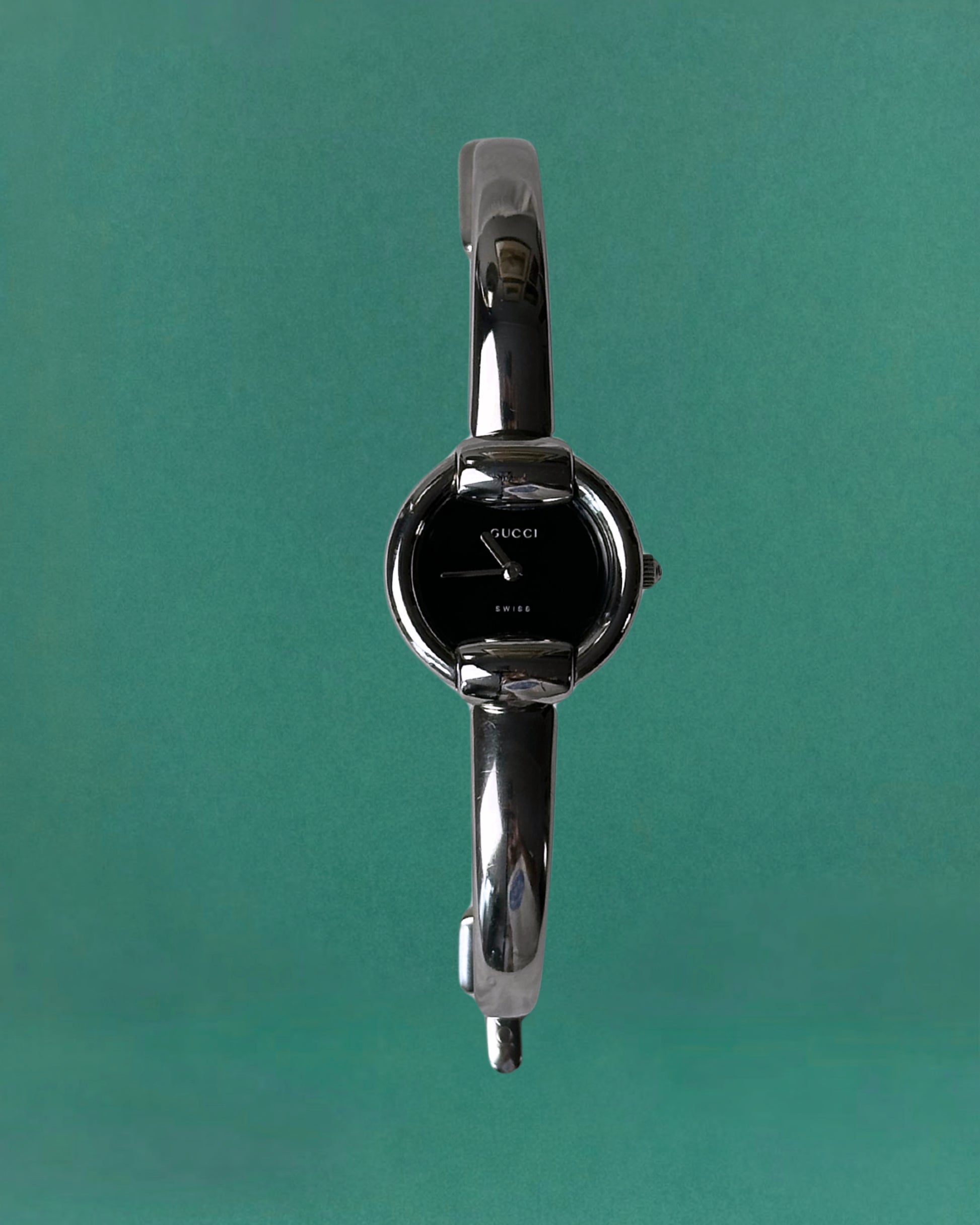 1990s Gucci Silver tone round quartz watch