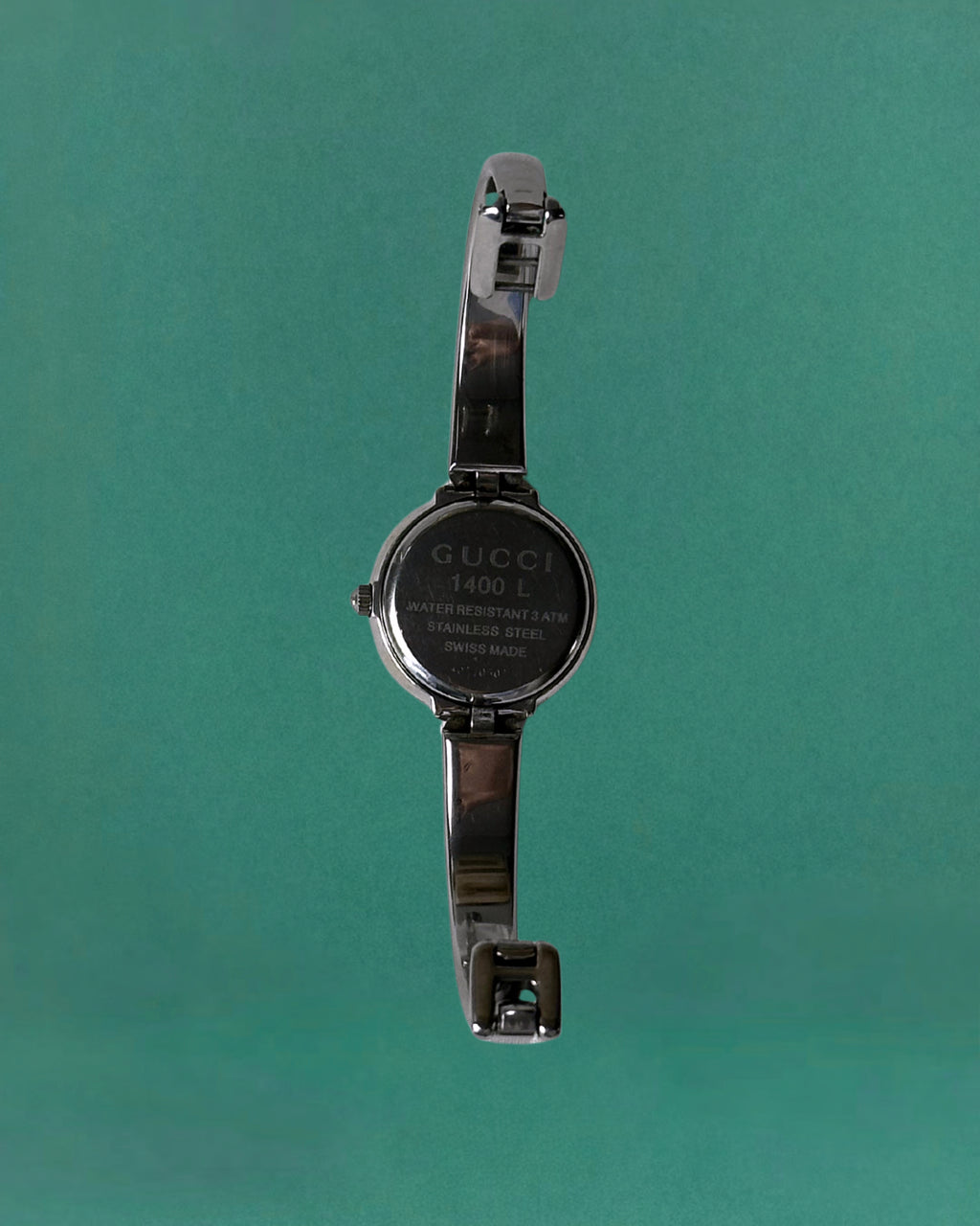 1990s Gucci Silver tone round quartz watch