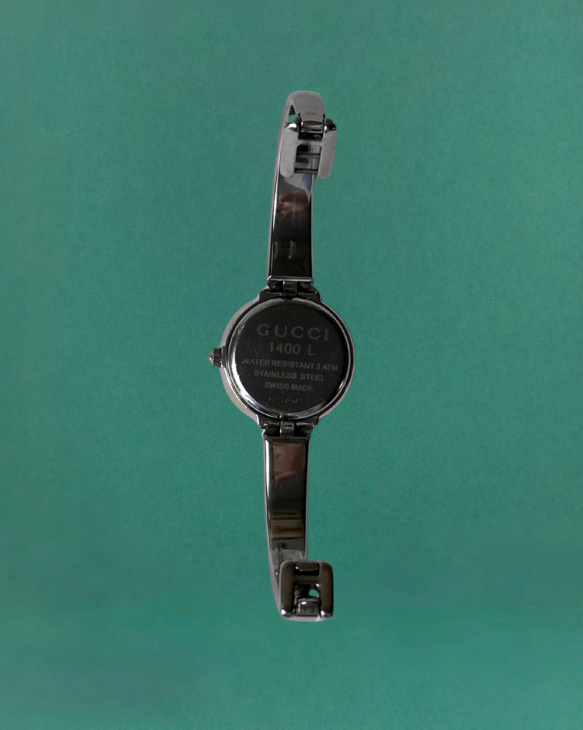1990s Gucci Silver tone round quartz watch