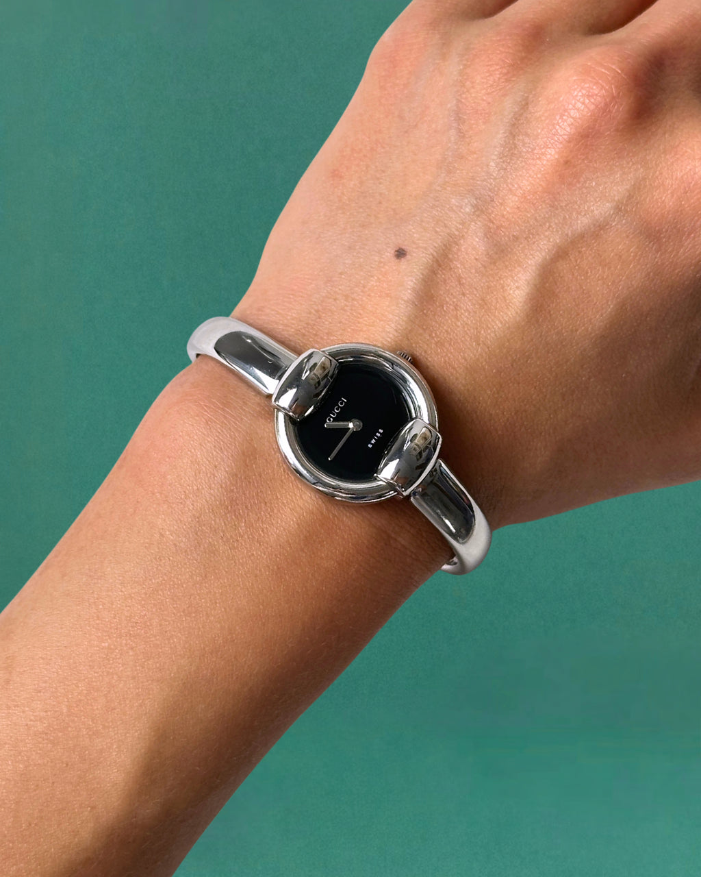 1990s Gucci Silver tone round quartz watch