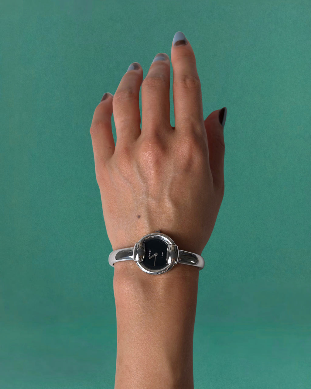 1990s Gucci Silver tone round quartz watch