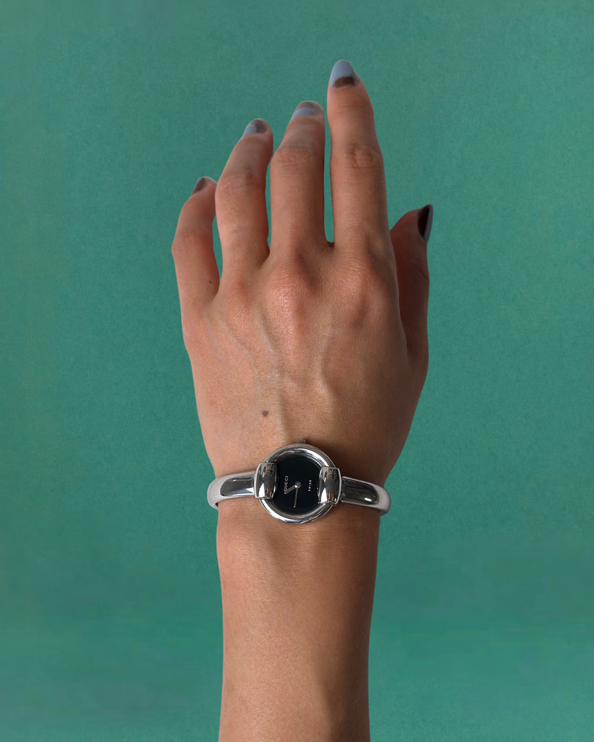 1990s Gucci Silver tone round quartz watch
