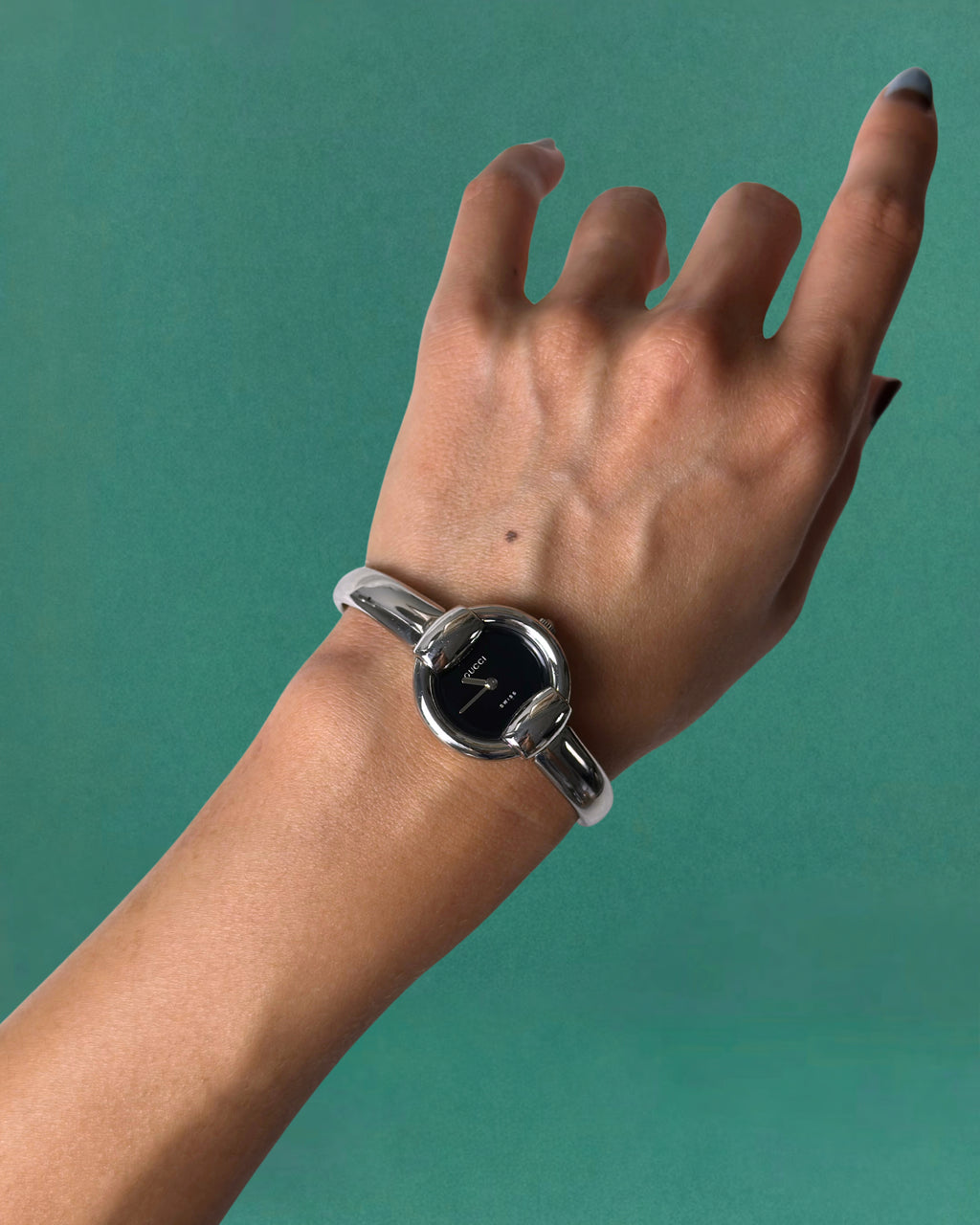 1990s Gucci Silver tone round quartz watch