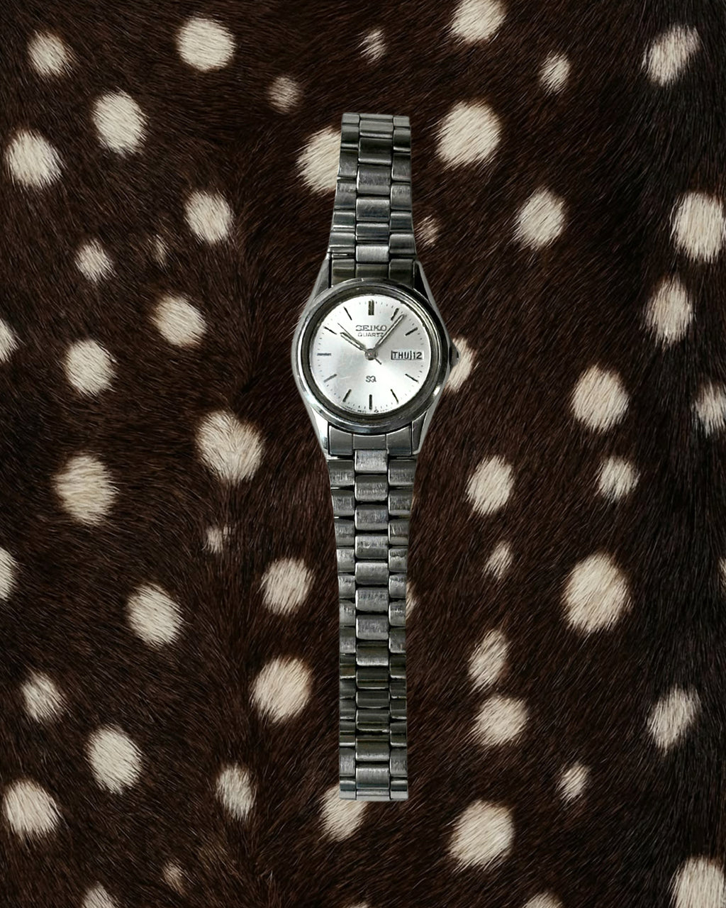 1980s Seiko date window silver-tone quartz watch