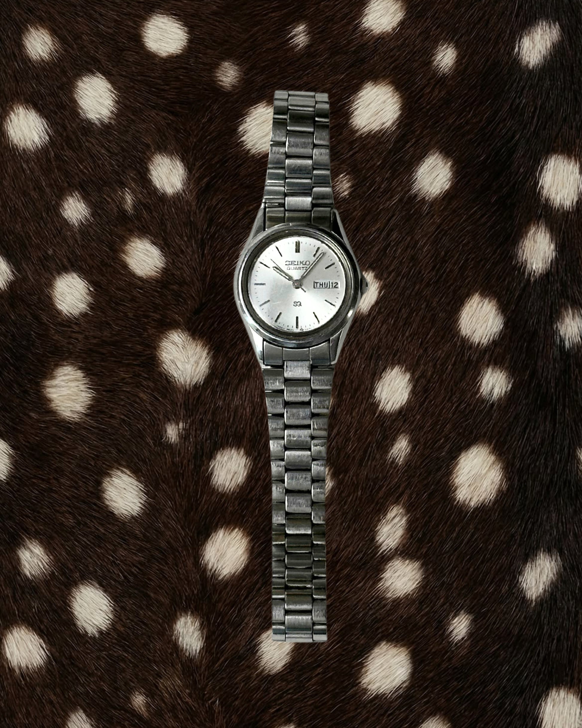 1980s Seiko date window silver-tone quartz watch