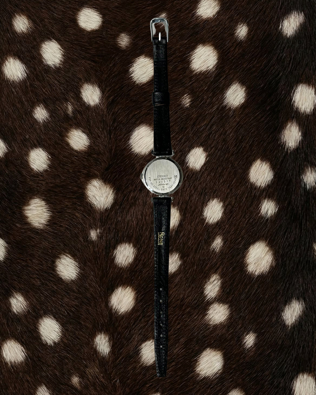 1980s Seiko round black leather quartz watch