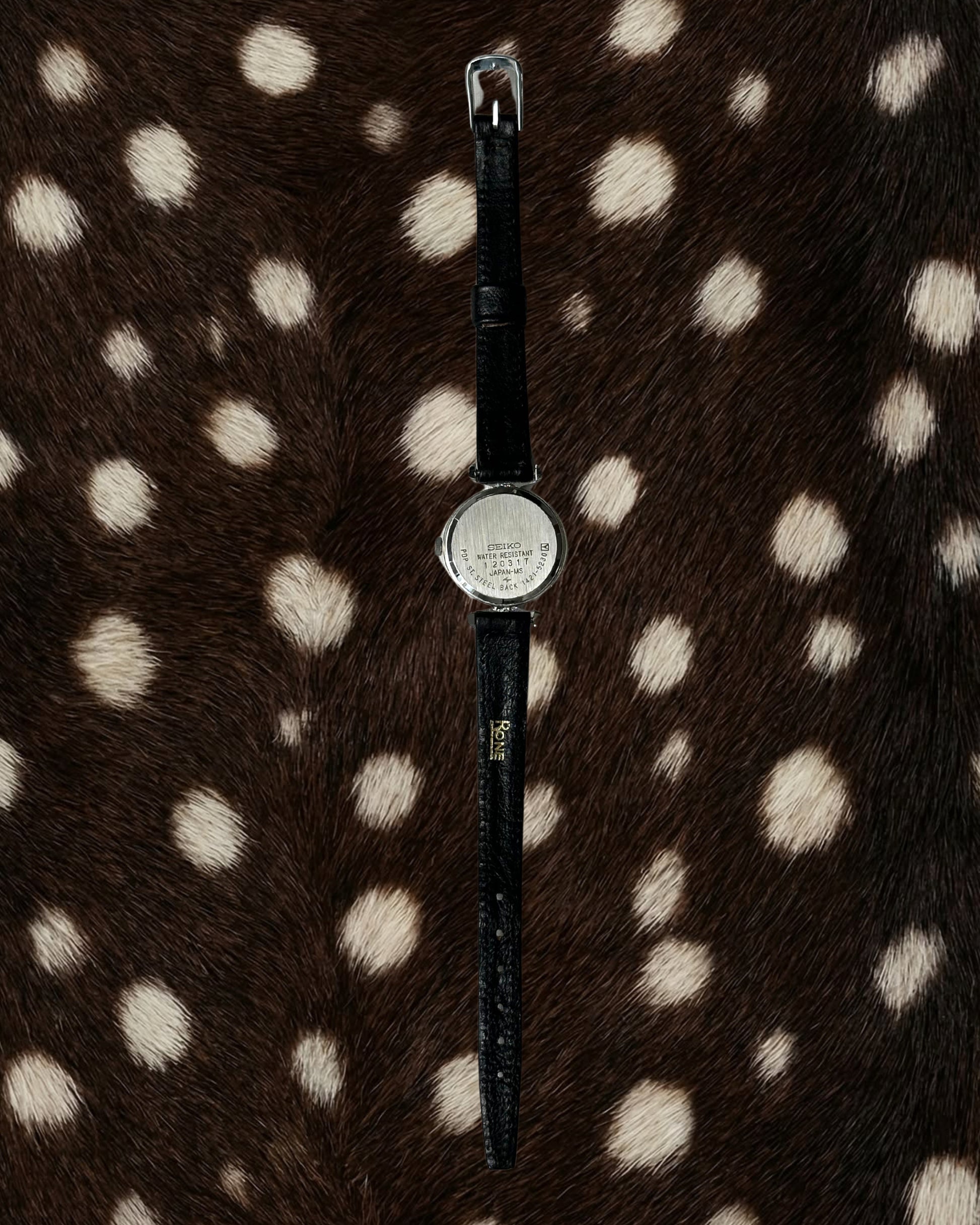 1980s Seiko round black leather quartz watch
