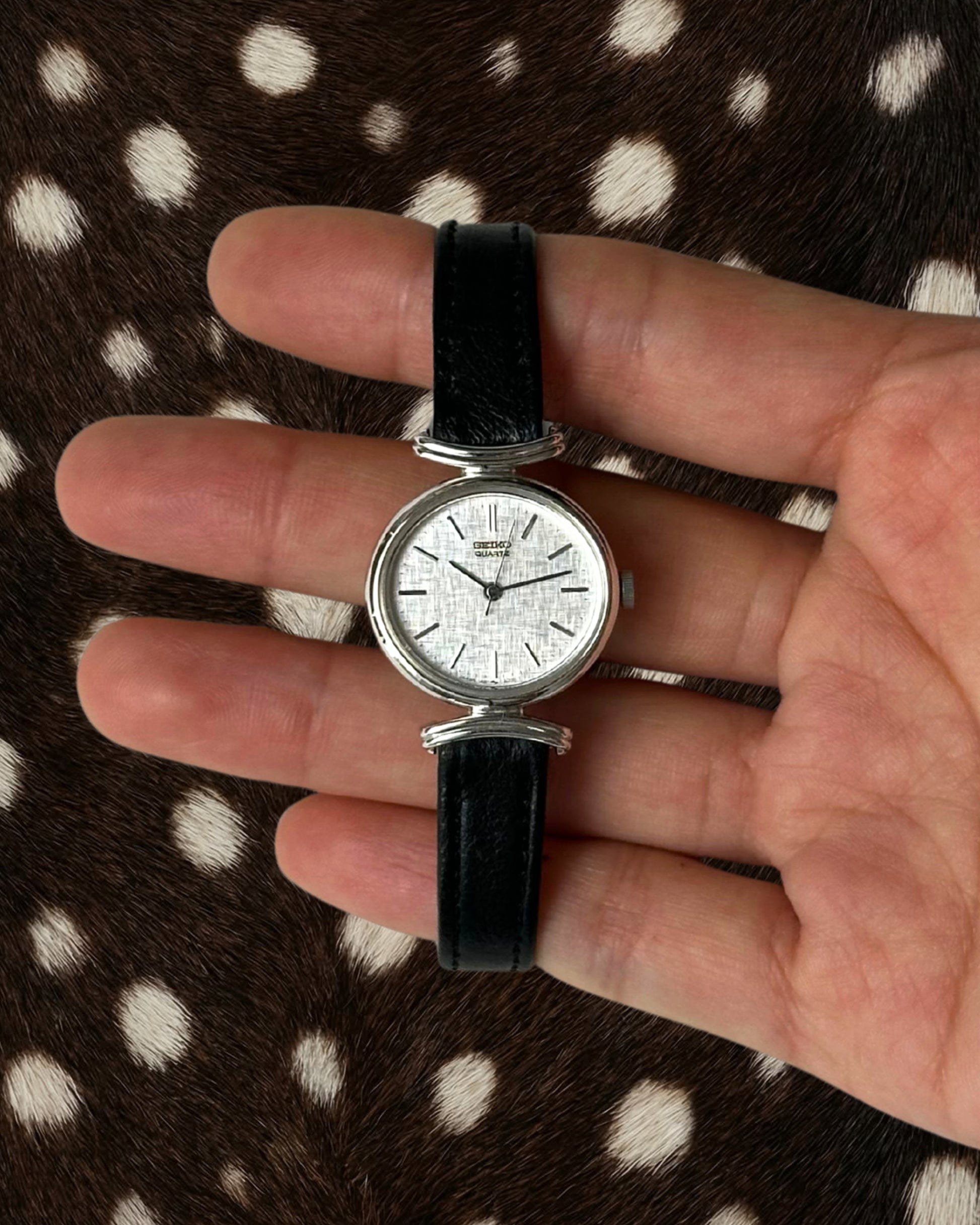 1980s Seiko round black leather quartz watch