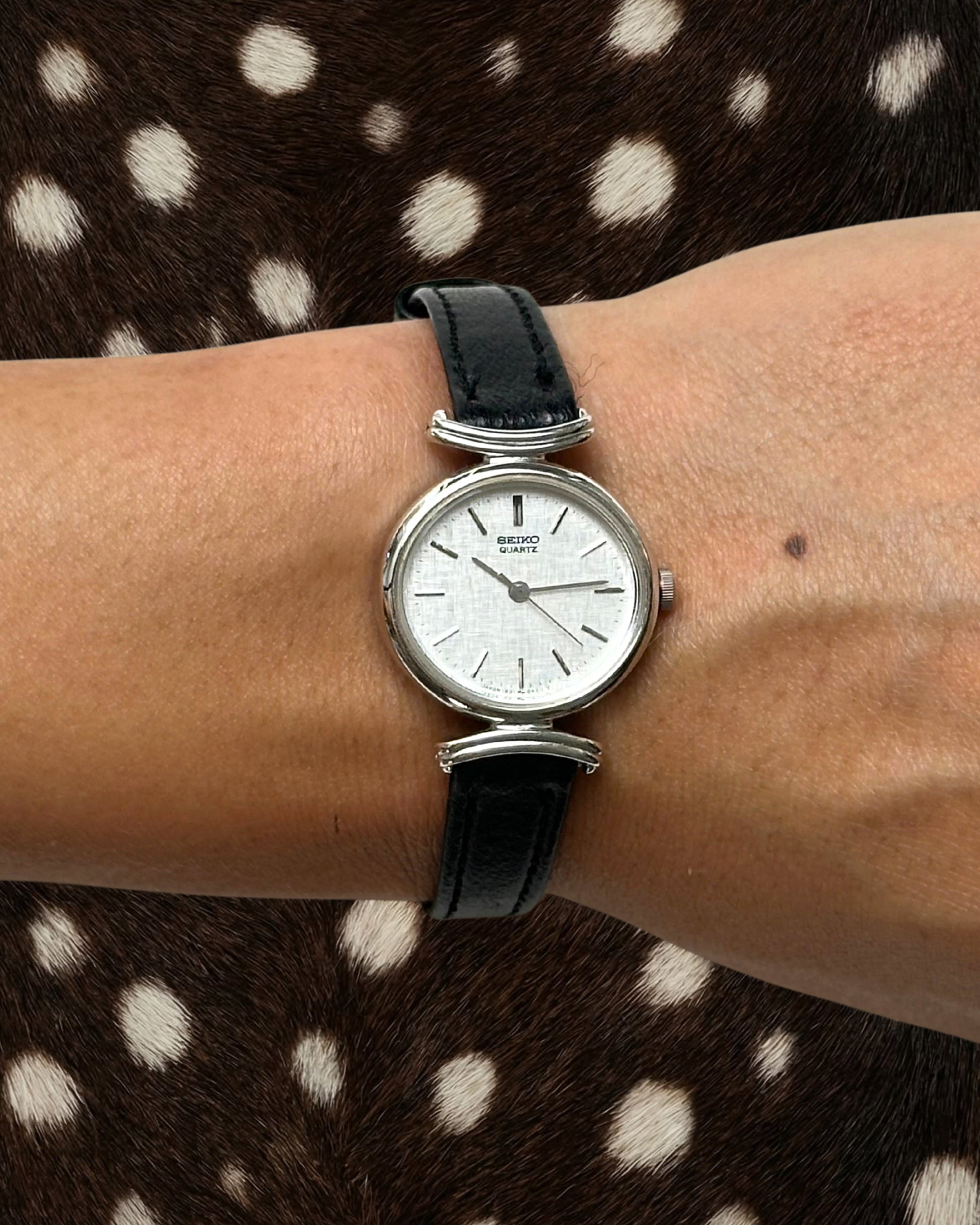1980s Seiko round black leather quartz watch
