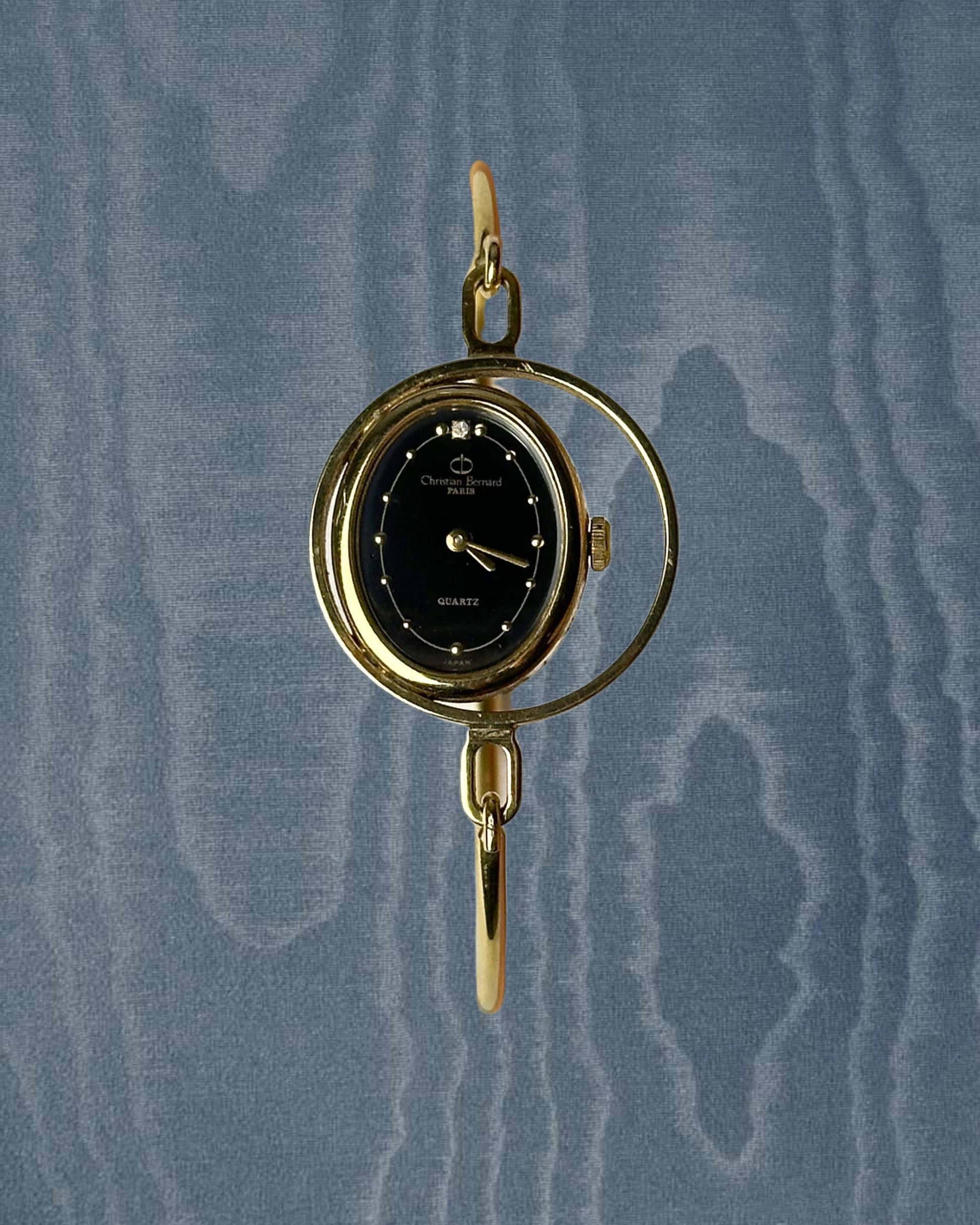 1980s Christian Bernard gold-plated bangle quartz watch