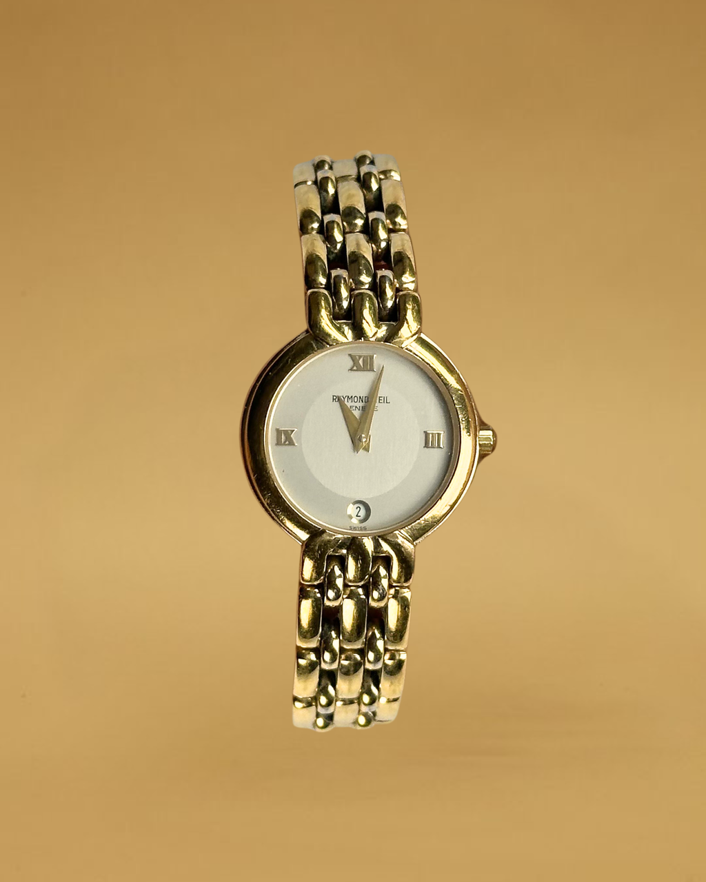1980s Raymond Weil gold-plated round quartz watch