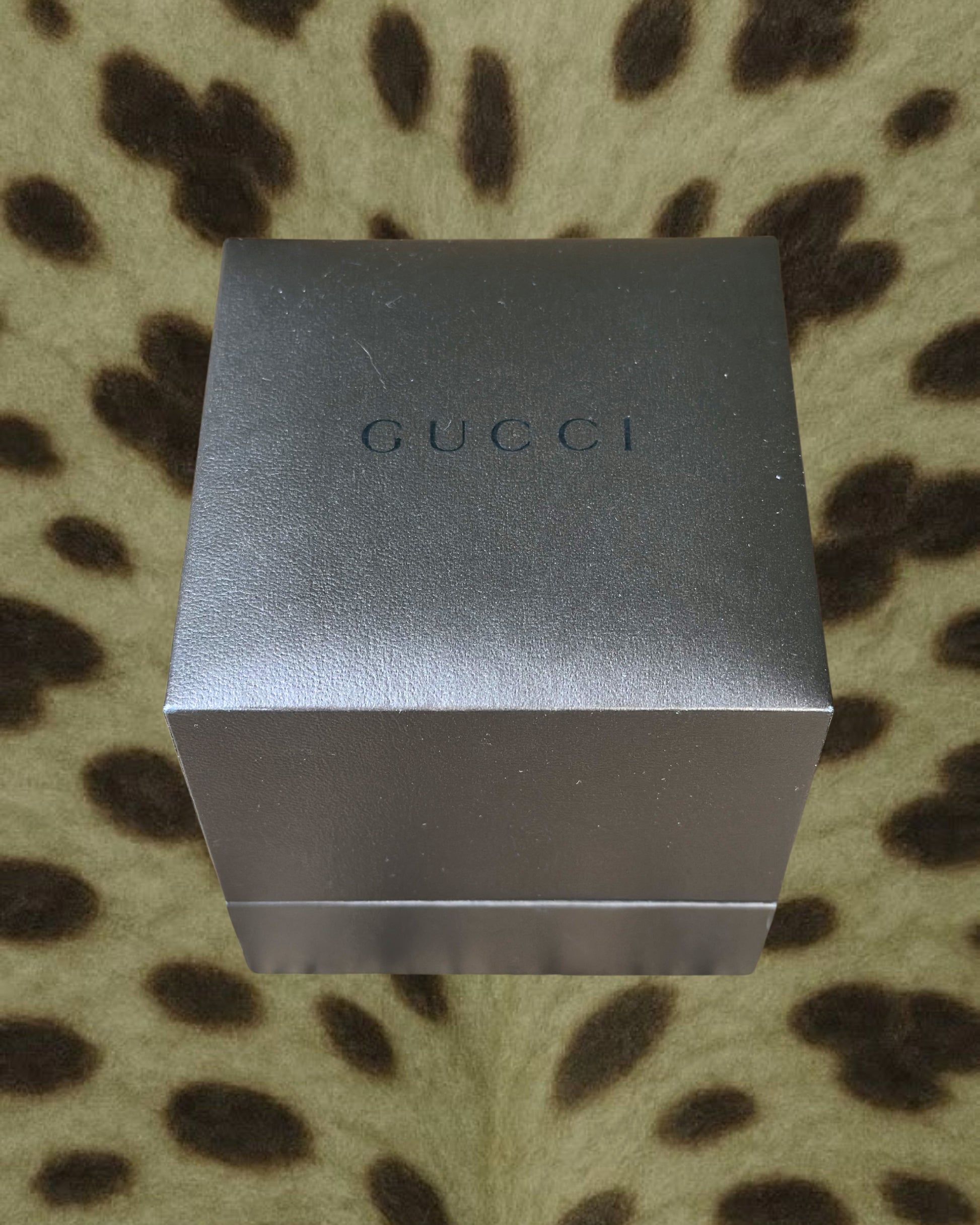 2000s Gucci silver tone silm quartz watch