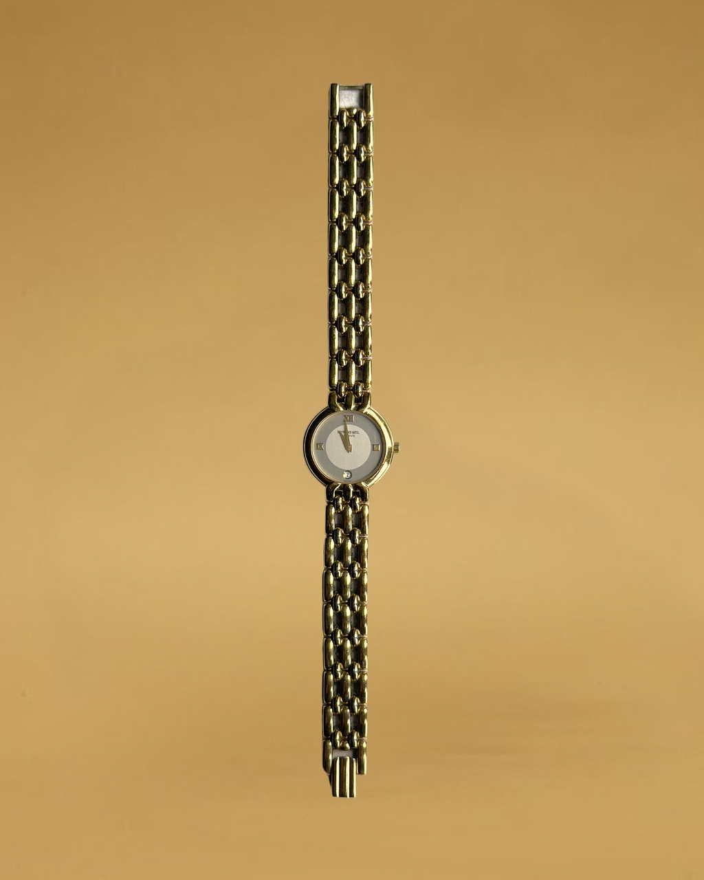 1980s Raymond Weil gold-plated round quartz watch