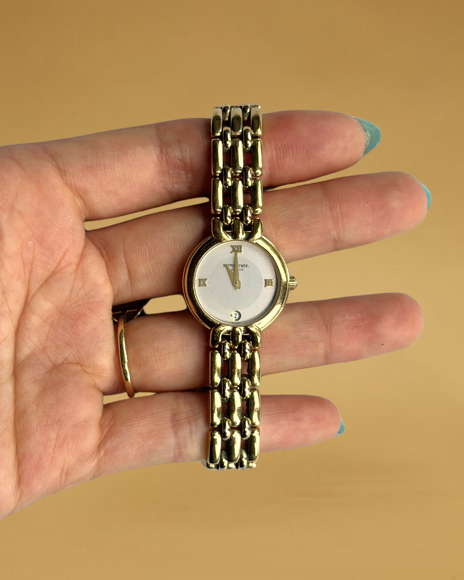 1980s Raymond Weil gold-plated round quartz watch