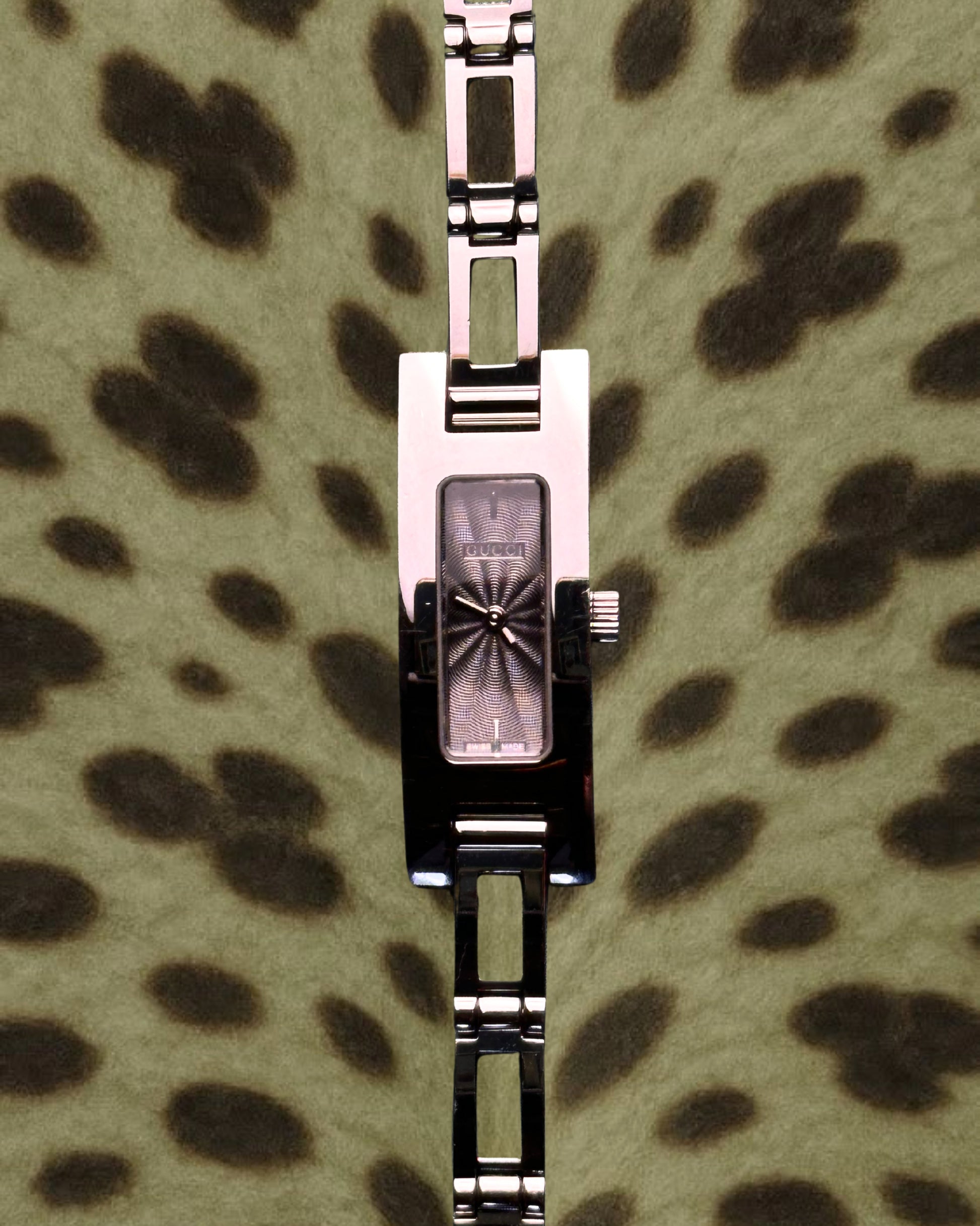 2000s Gucci silver tone silm quartz watch