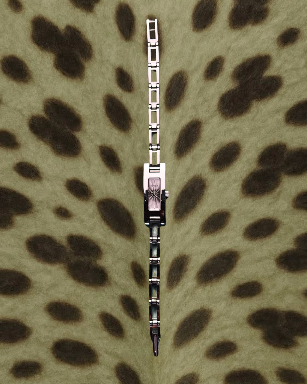 2000s Gucci silver tone silm quartz watch
