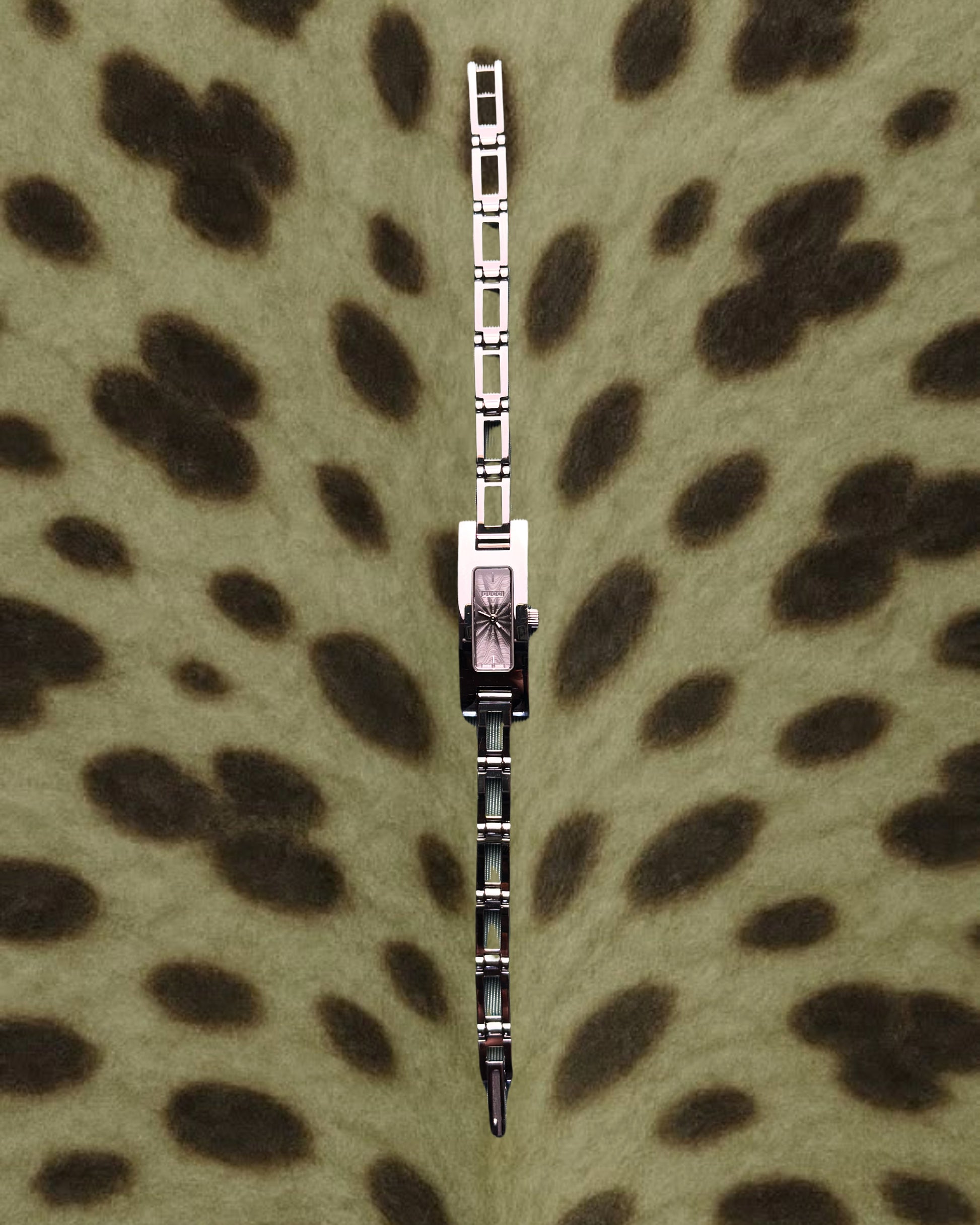 2000s Gucci silver tone silm quartz watch
