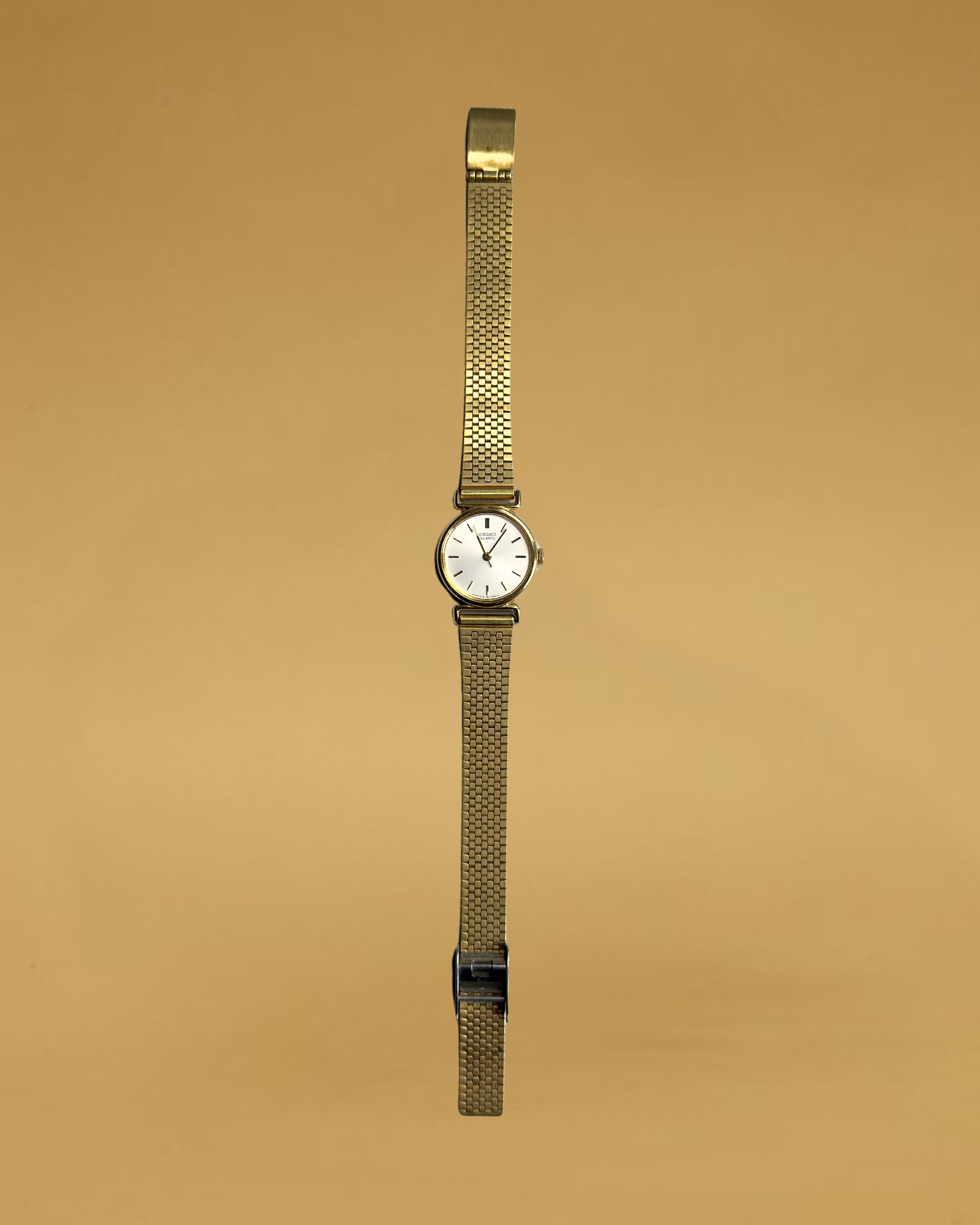 1980s Seiko gold-plated round quartz watch