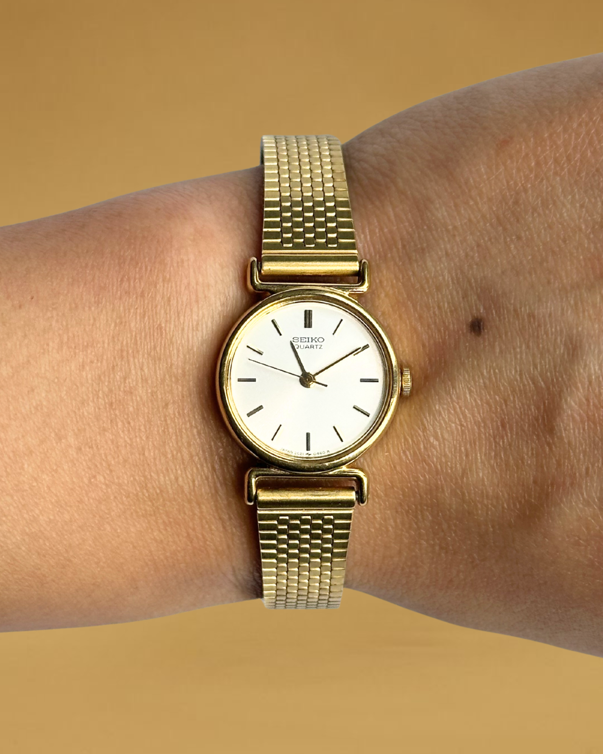 1980s Seiko gold-plated round quartz watch