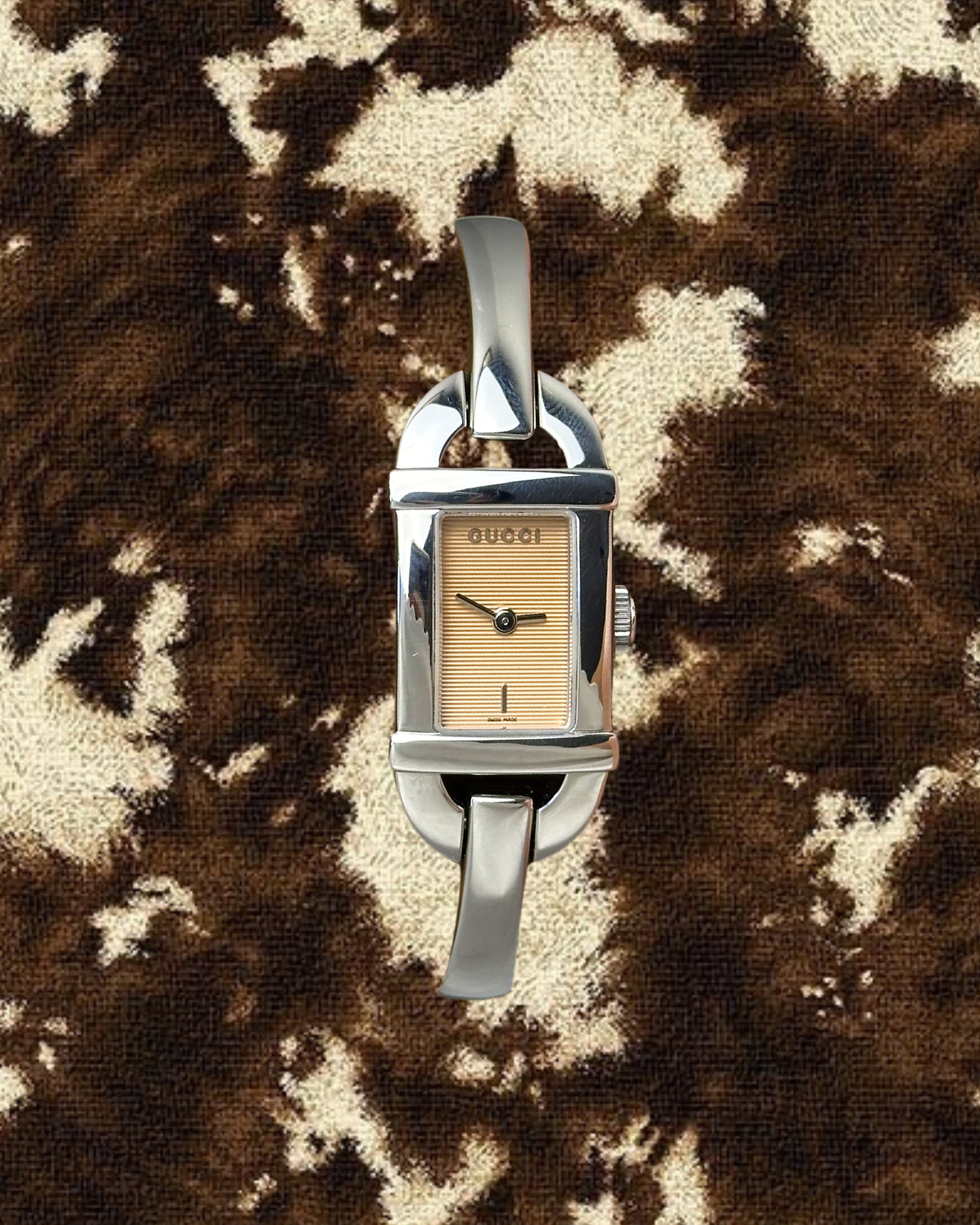2000s Gucci pink dial silver-tone bangle quartz watch