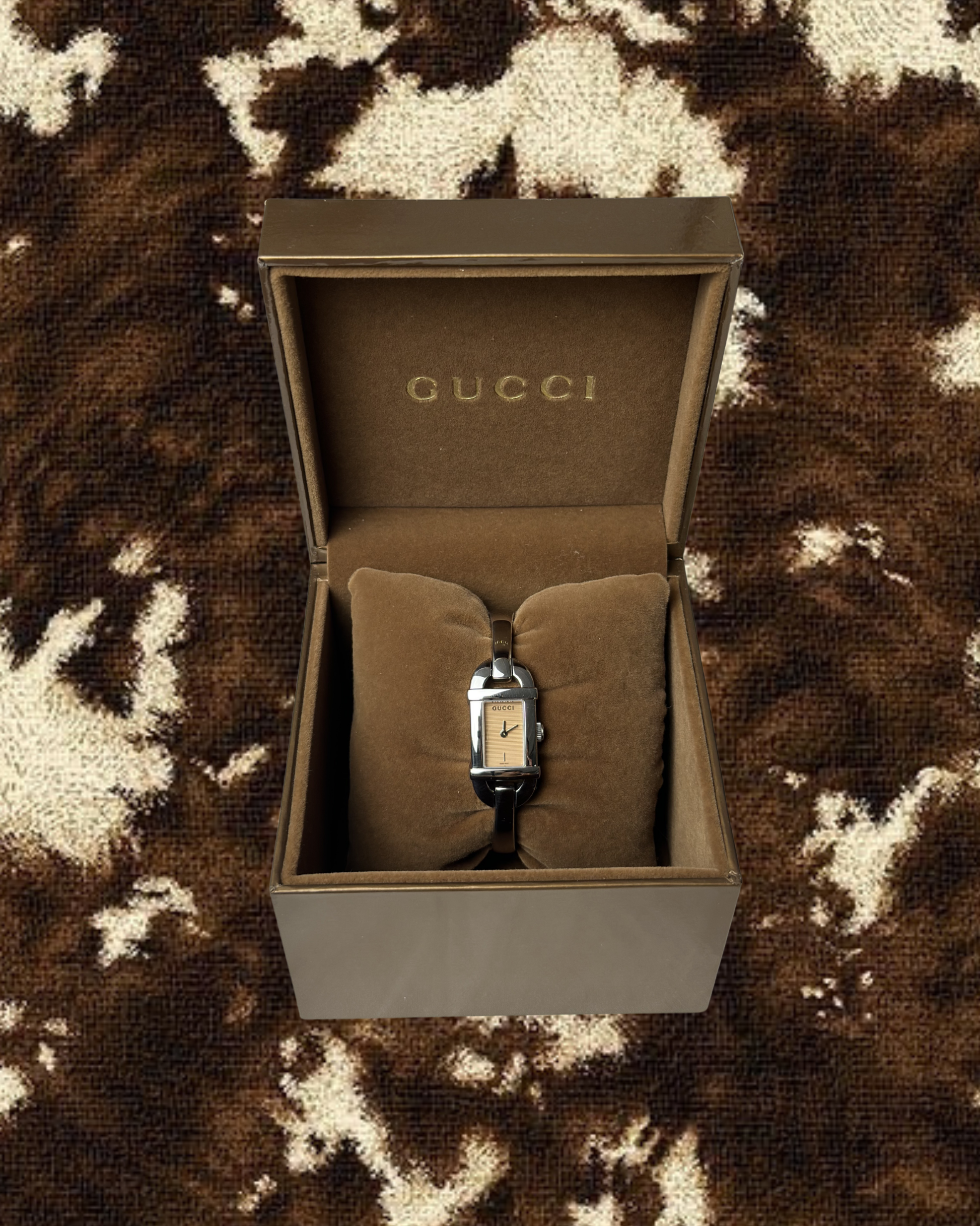 2000s Gucci pink dial silver-tone bangle quartz watch