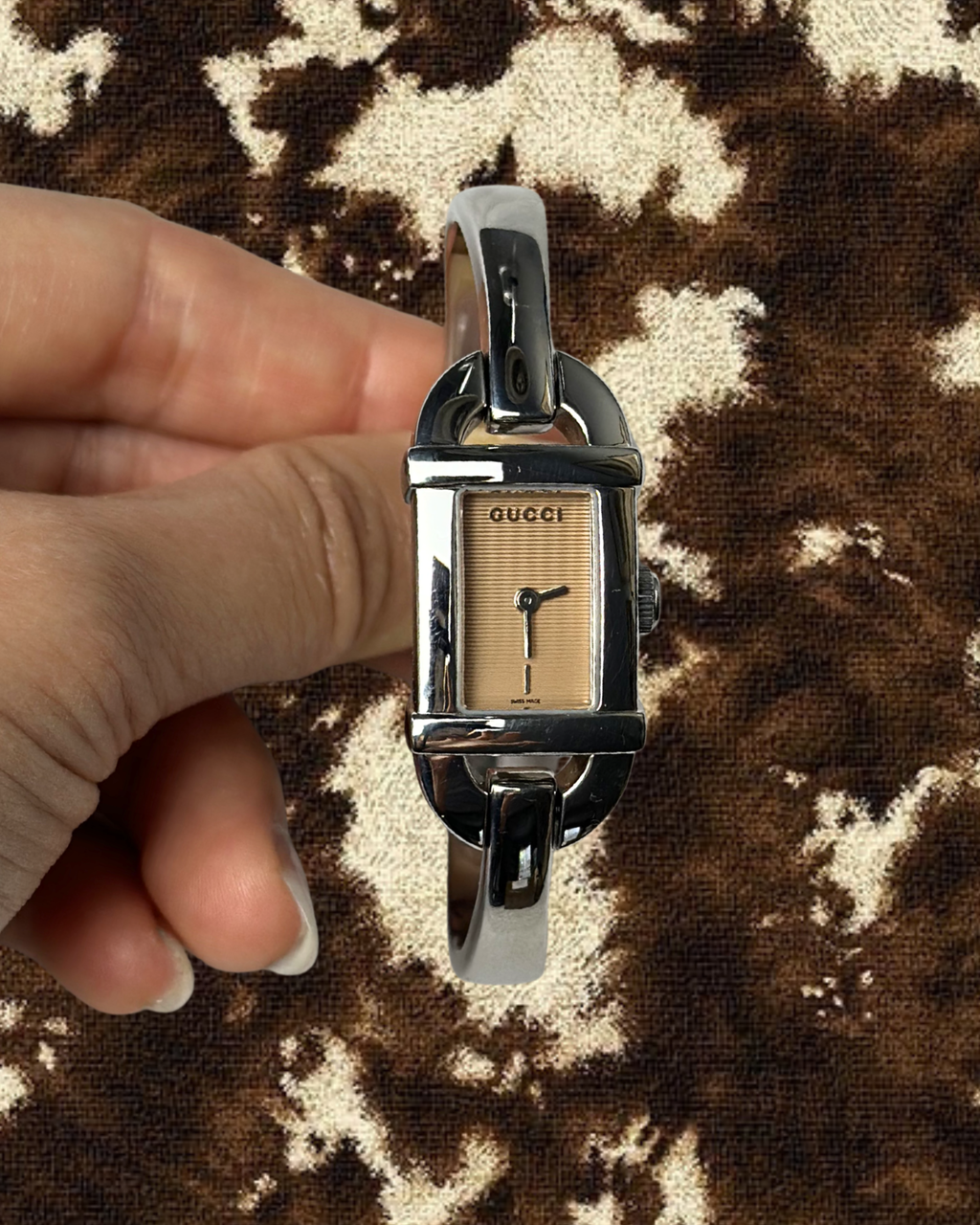 2000s Gucci pink dial silver-tone bangle quartz watch