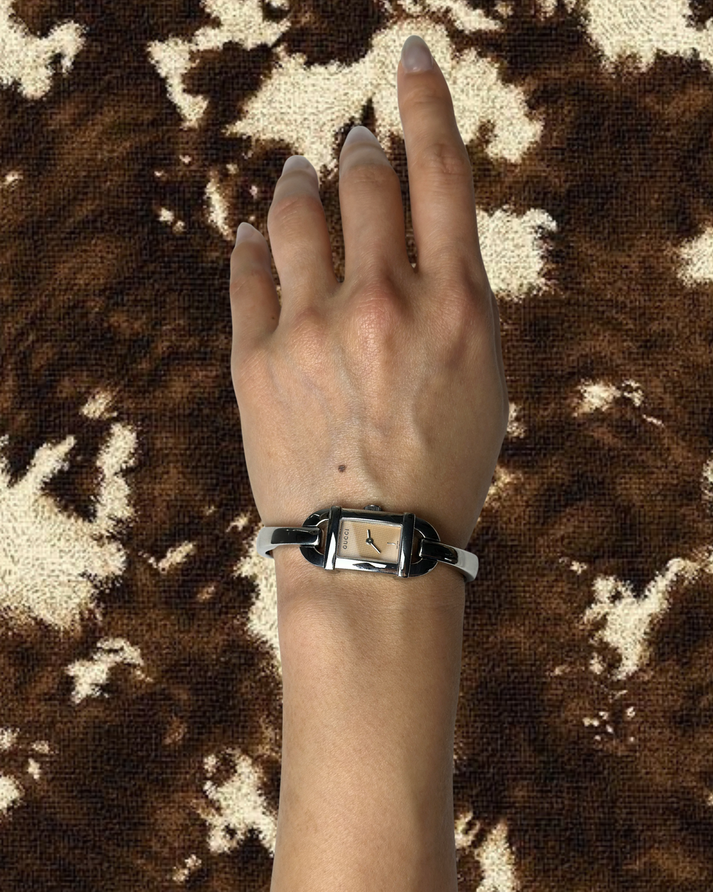 2000s Gucci pink dial silver-tone bangle quartz watch