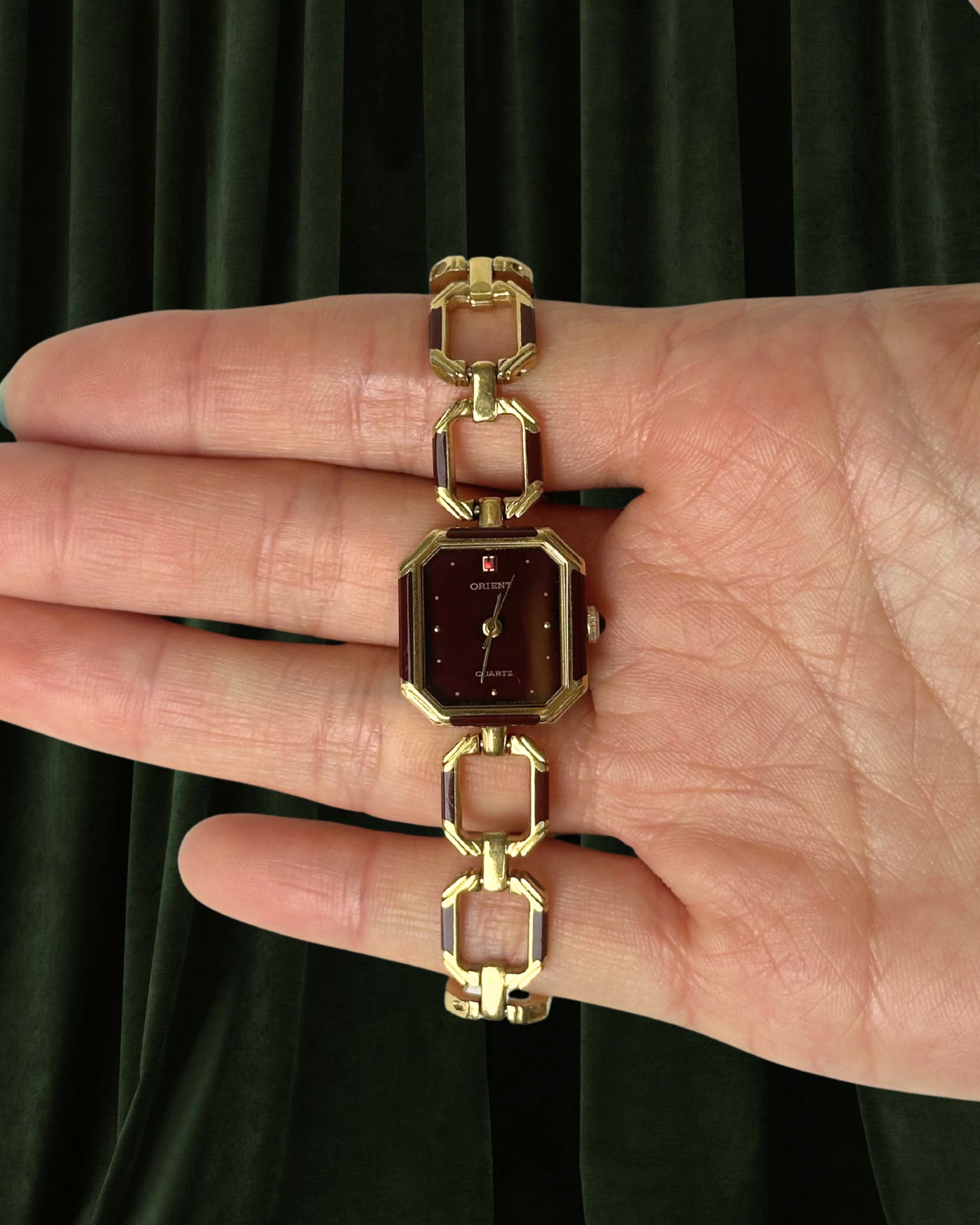 1980s Orient burgundy octagon quartz watch