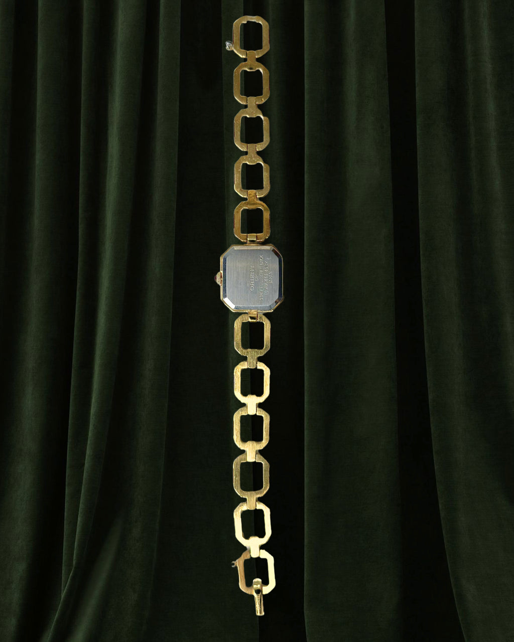 1980s Orient burgundy octagon quartz watch