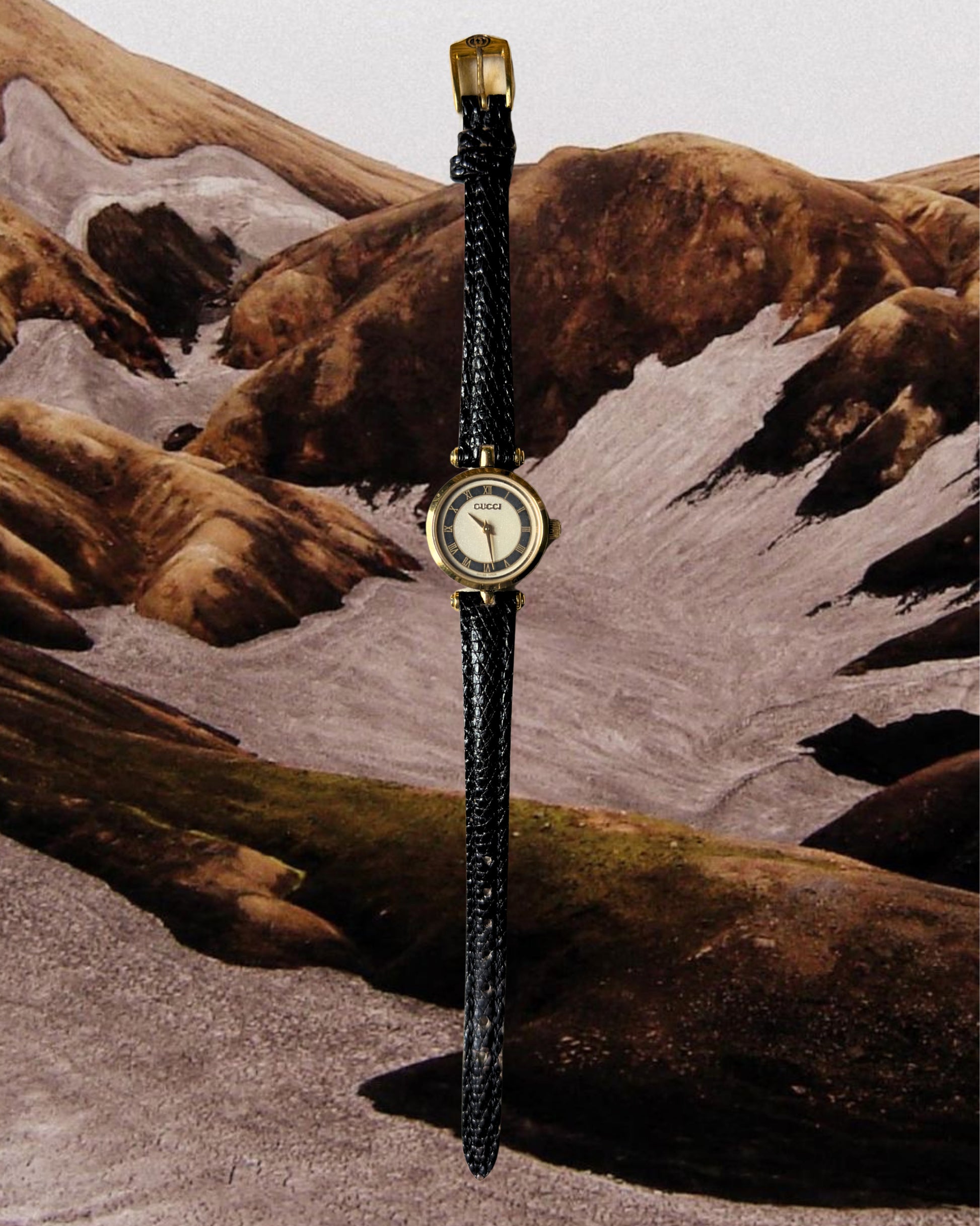 1980s Gucci Roman dial black leather quartz watch