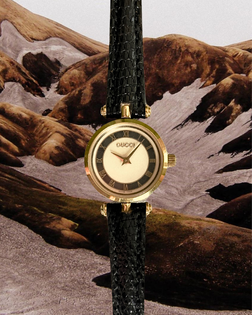 1980s Gucci Roman dial black leather quartz watch