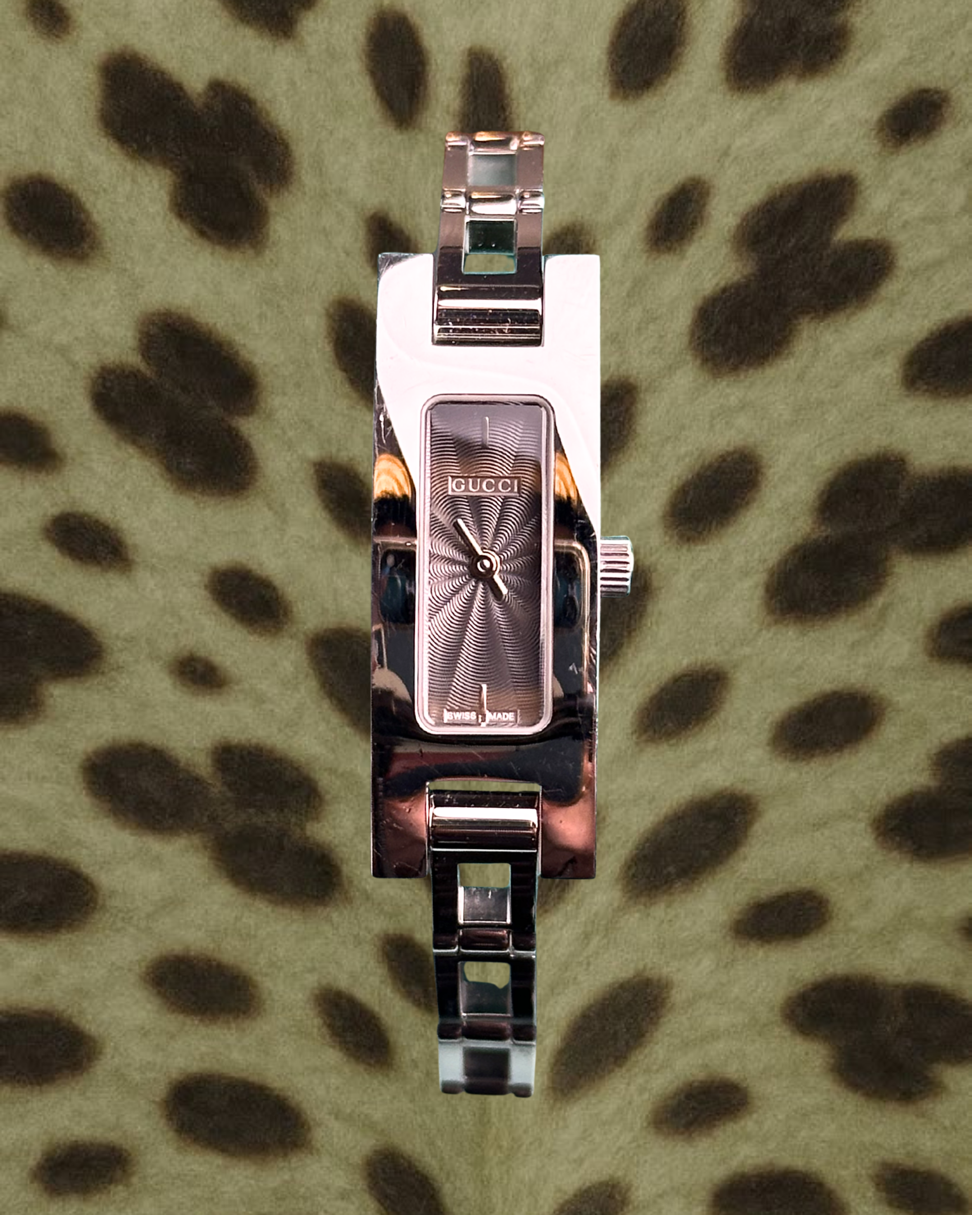 2000s Gucci silver tone silm quartz watch