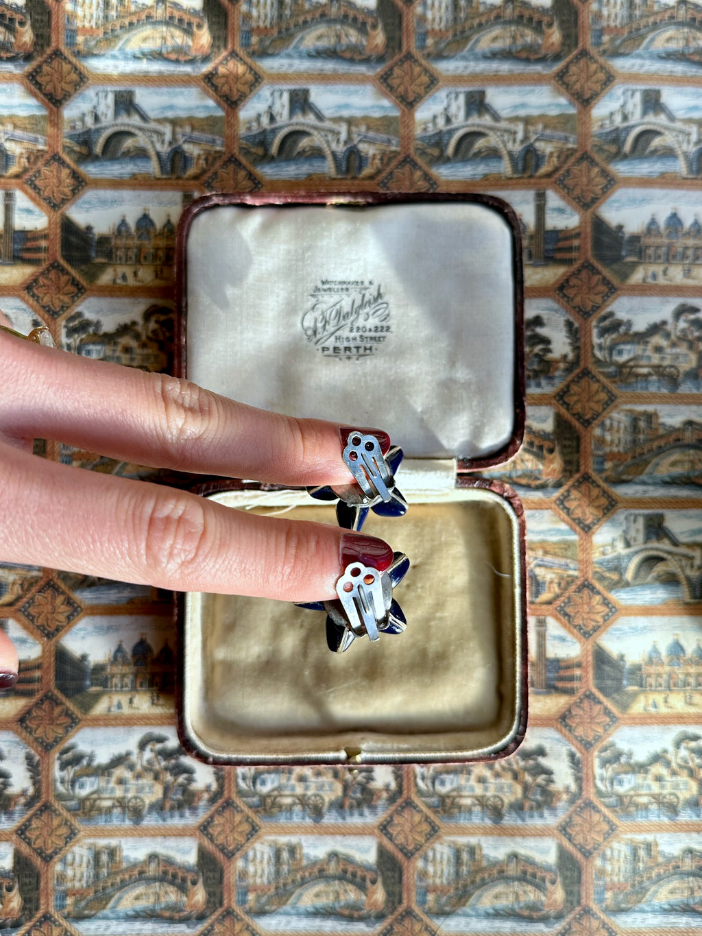 Bellflower blue plastic clip-on earrings