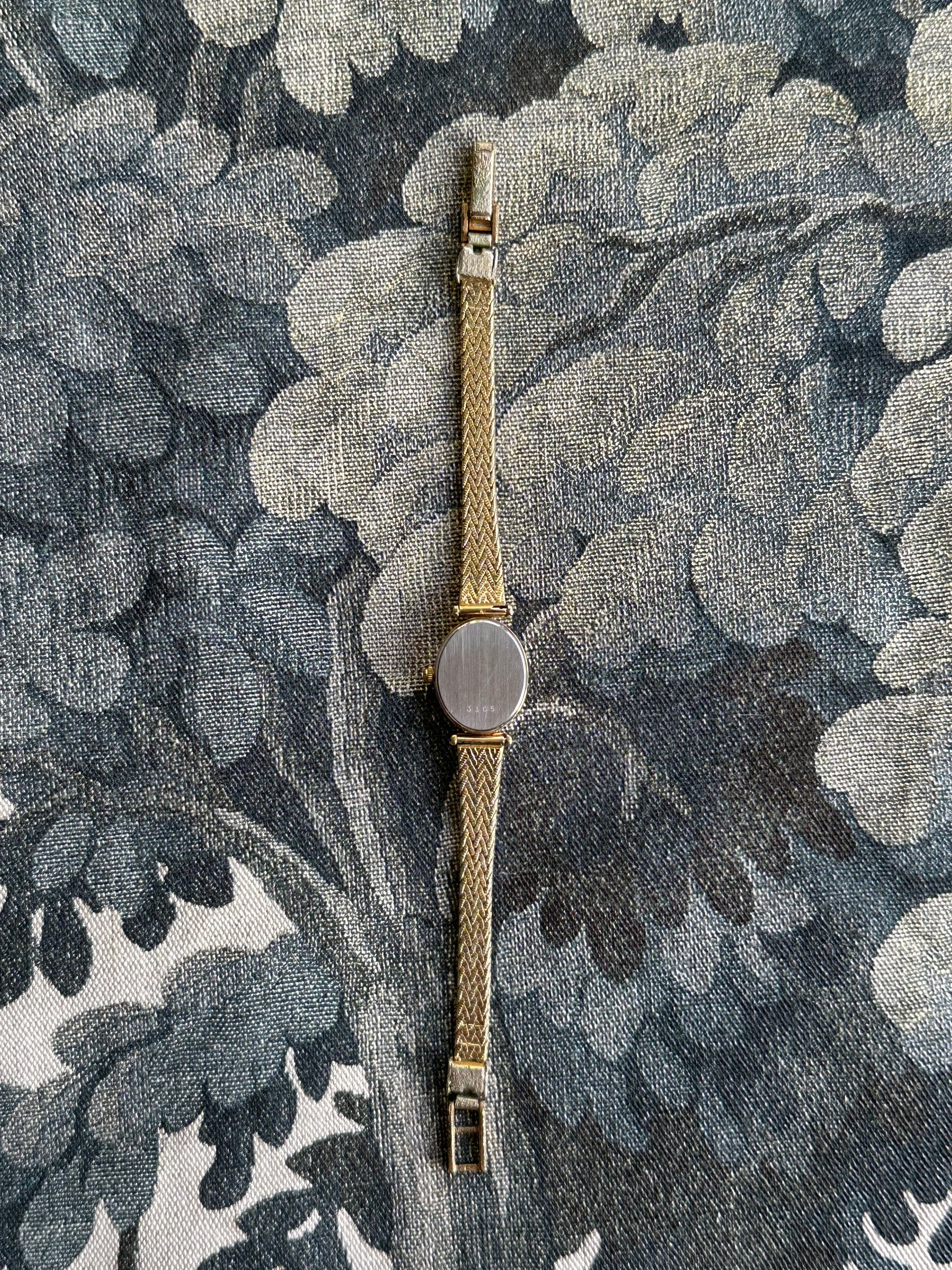 1980s Rotary black oval gold-plated quartz watch